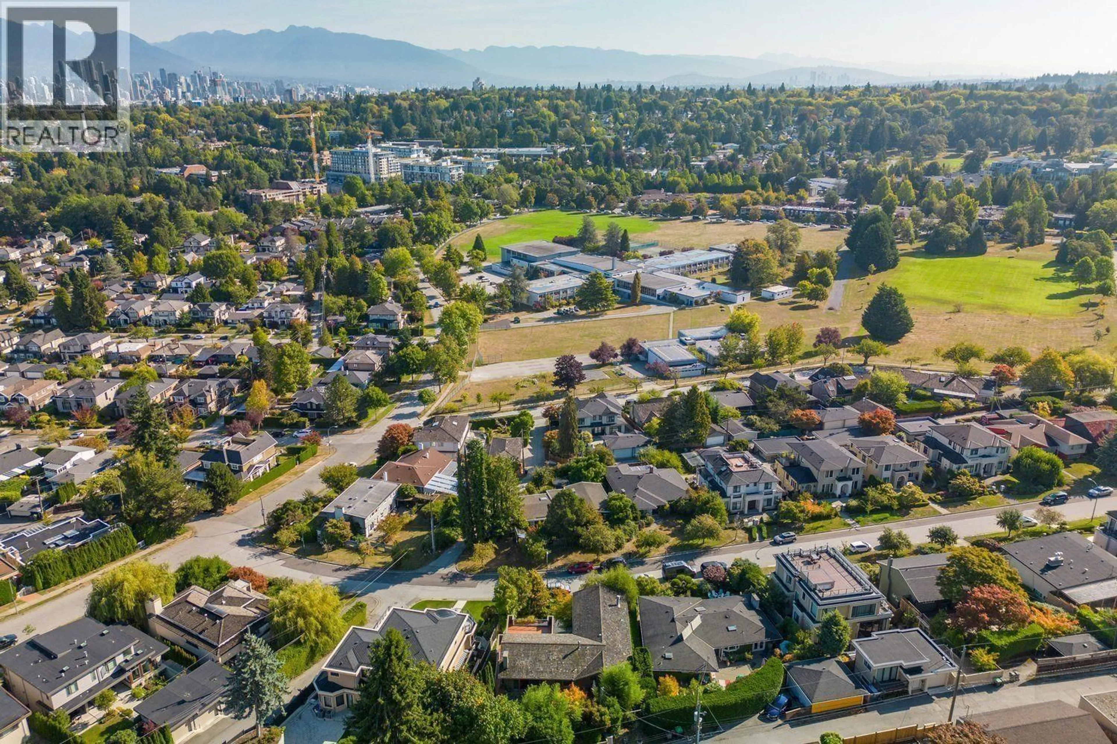 A pic from outside/outdoor area/front of a property/back of a property/a pic from drone, mountain view for 4729 PATON STREET, Vancouver British Columbia V6L2H9
