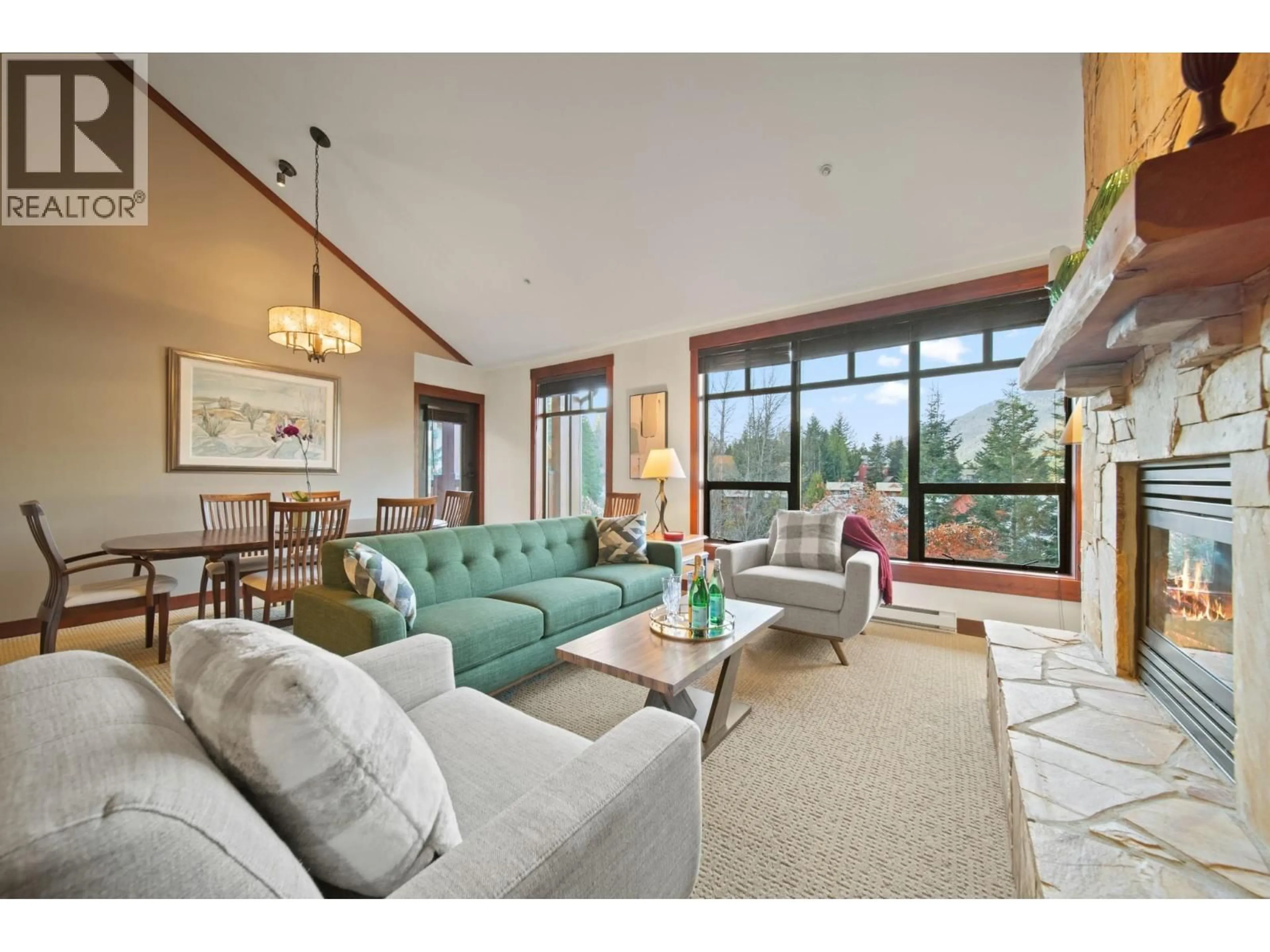 Living room with furniture, unknown for 402 - 2202 GONDOLA WAY, Whistler British Columbia V8E0M7