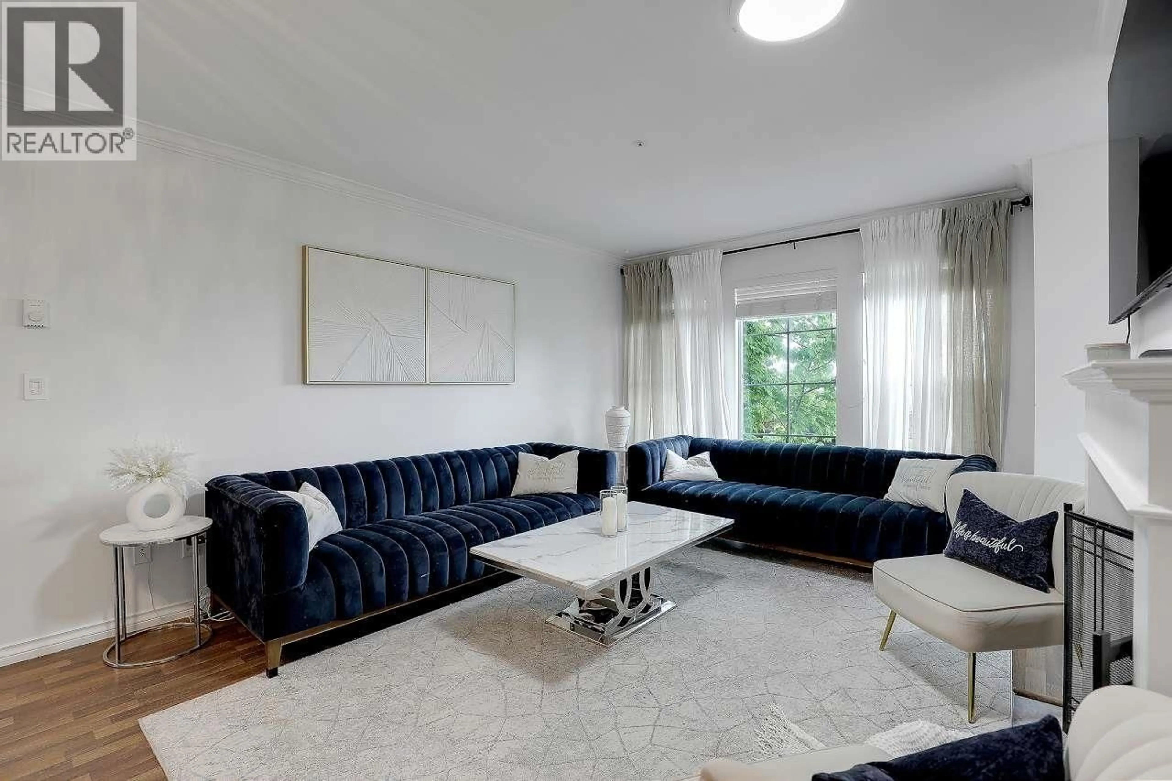 Living room with furniture, unknown for 213 - 888 GAUTHIER AVENUE, Coquitlam British Columbia V3K6Y1