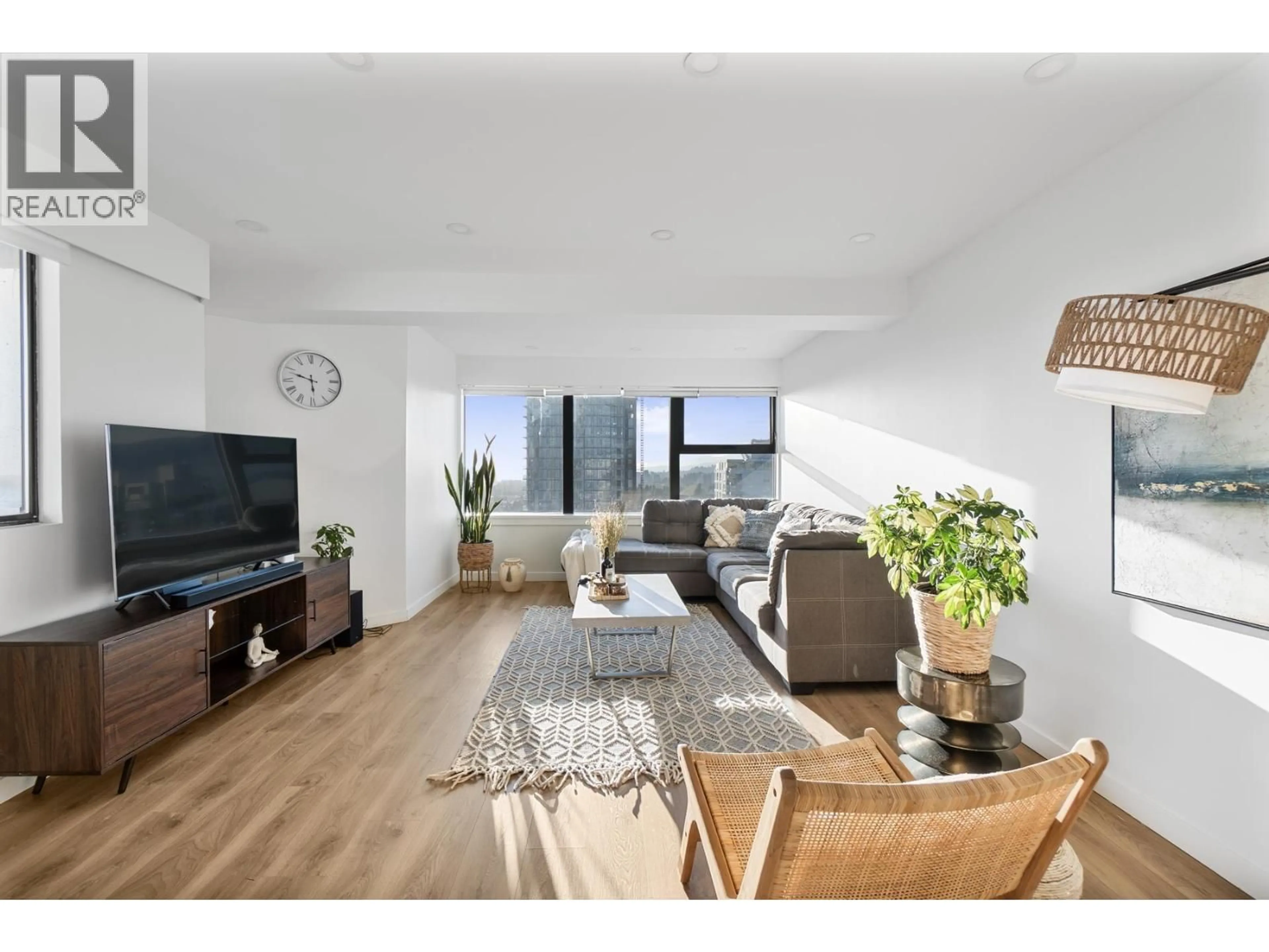 Living room with furniture, wood/laminate floor for 1304 - 1515 EASTERN AVENUE, North Vancouver British Columbia V7L4R2