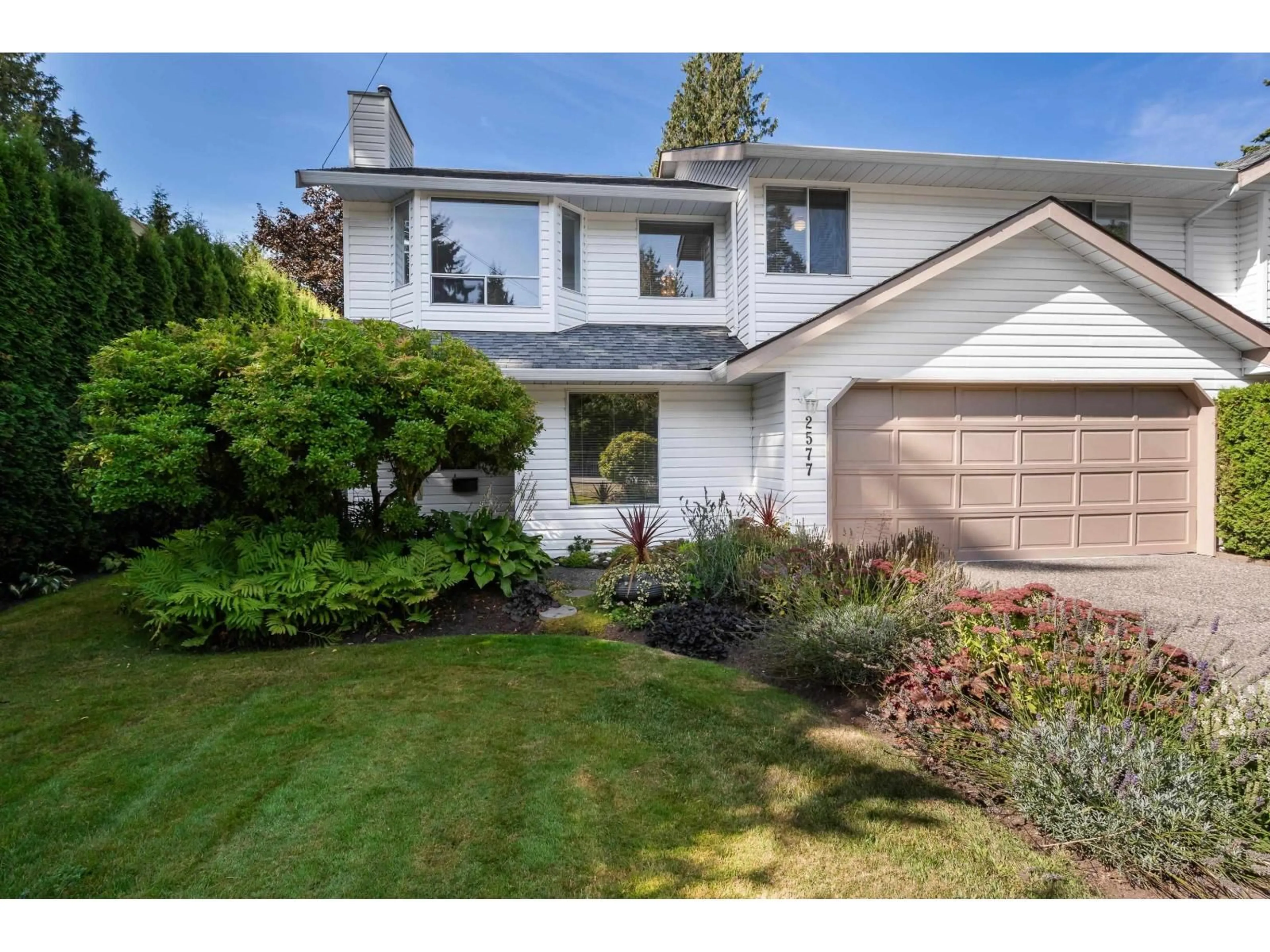 Home with vinyl exterior material, street for 2577 126TH, Surrey British Columbia V4A3P6