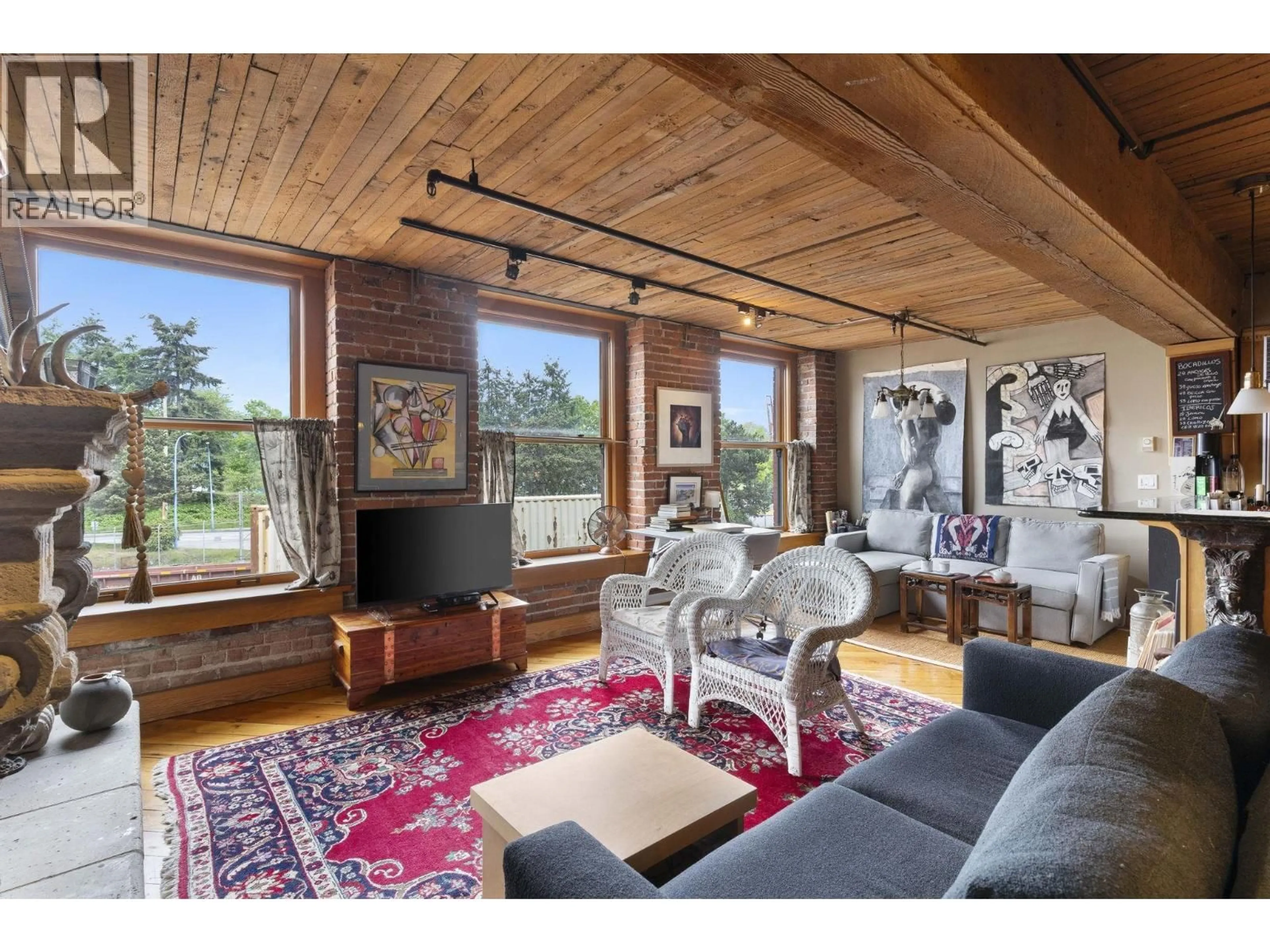 Living room with furniture, wood/laminate floor for 301 - 41 ALEXANDER STREET, Vancouver British Columbia V6A1B2