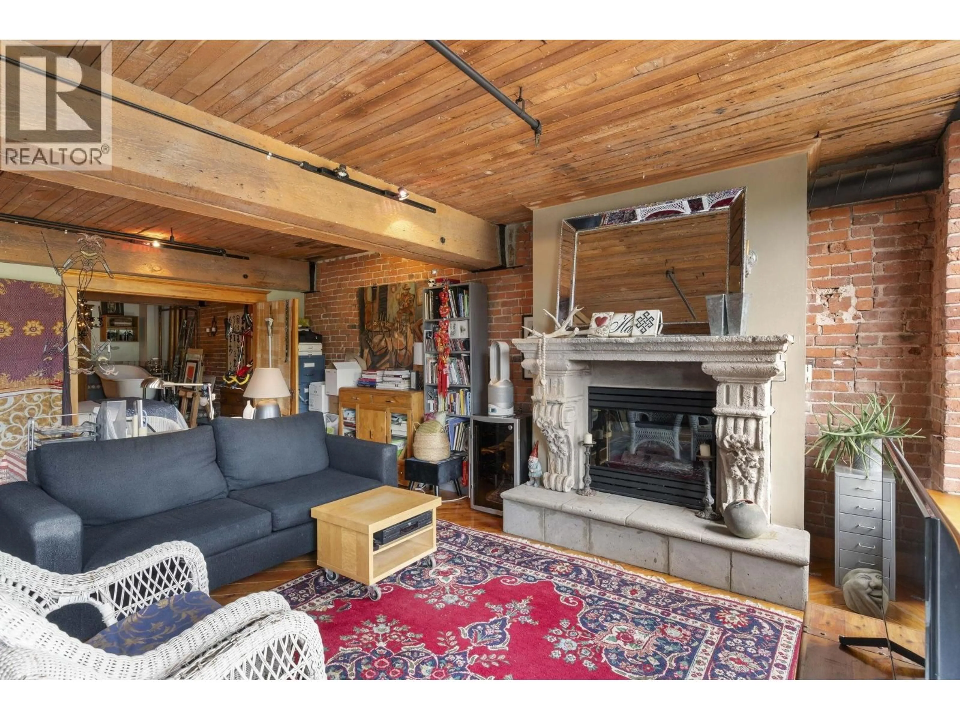 Living room with furniture, unknown for 301 - 41 ALEXANDER STREET, Vancouver British Columbia V6A1B2