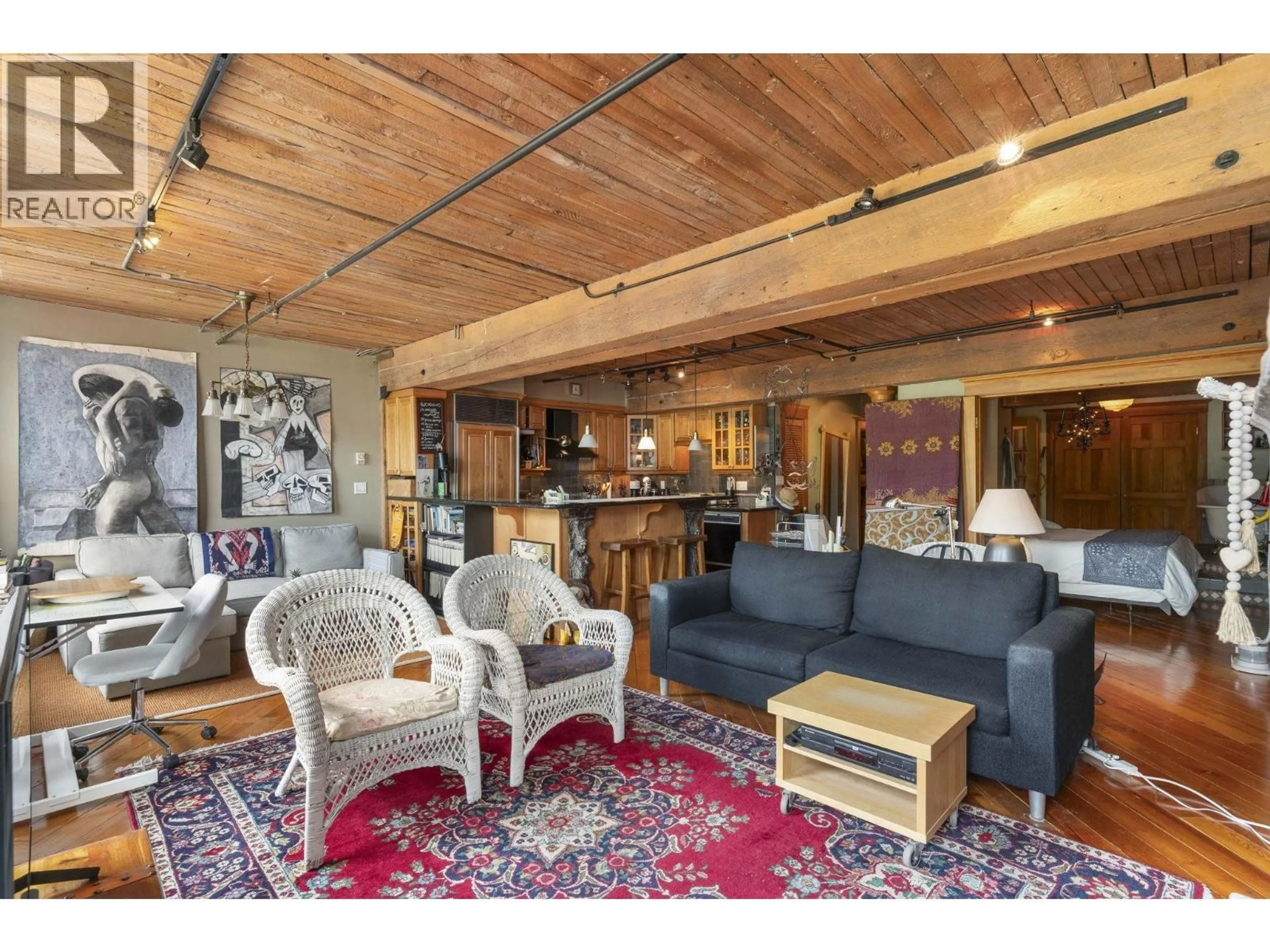 Living room with furniture, wood/laminate floor for 301 - 41 ALEXANDER STREET, Vancouver British Columbia V6A1B2