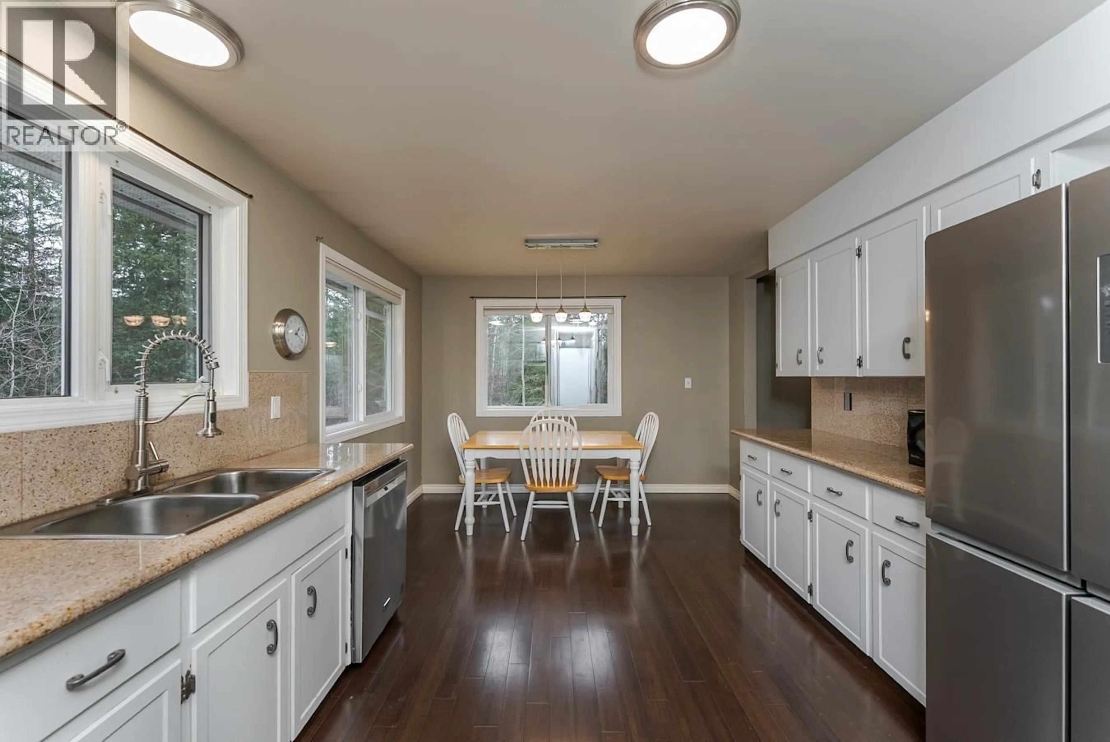 Open concept kitchen, wood/laminate floor for 13950 ATHABASCA DRIVE, Prince George British Columbia V2N5X9