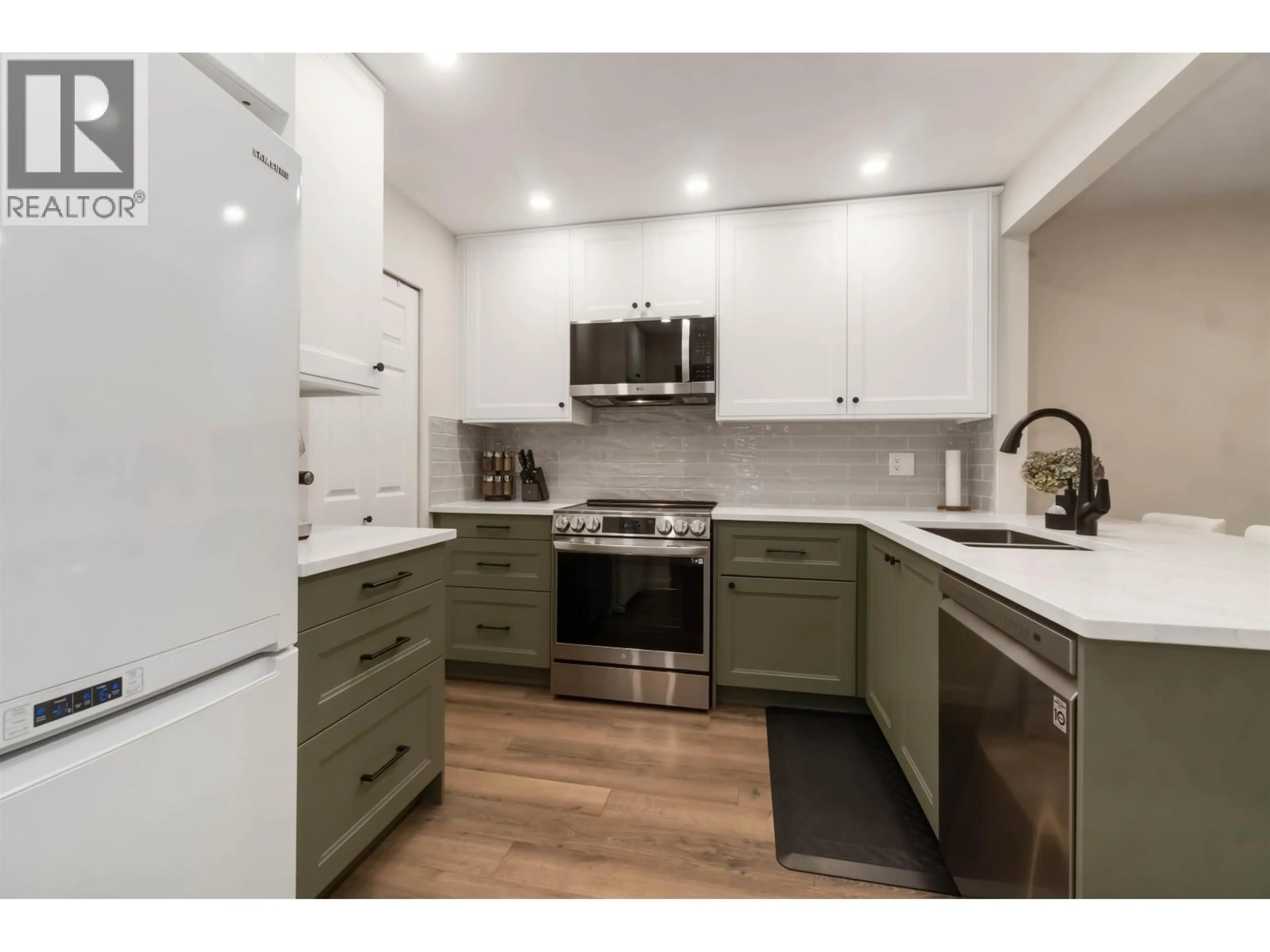 Open concept kitchen, unknown for 310 - 1000 BOWRON COURT, North Vancouver British Columbia V7H2V8