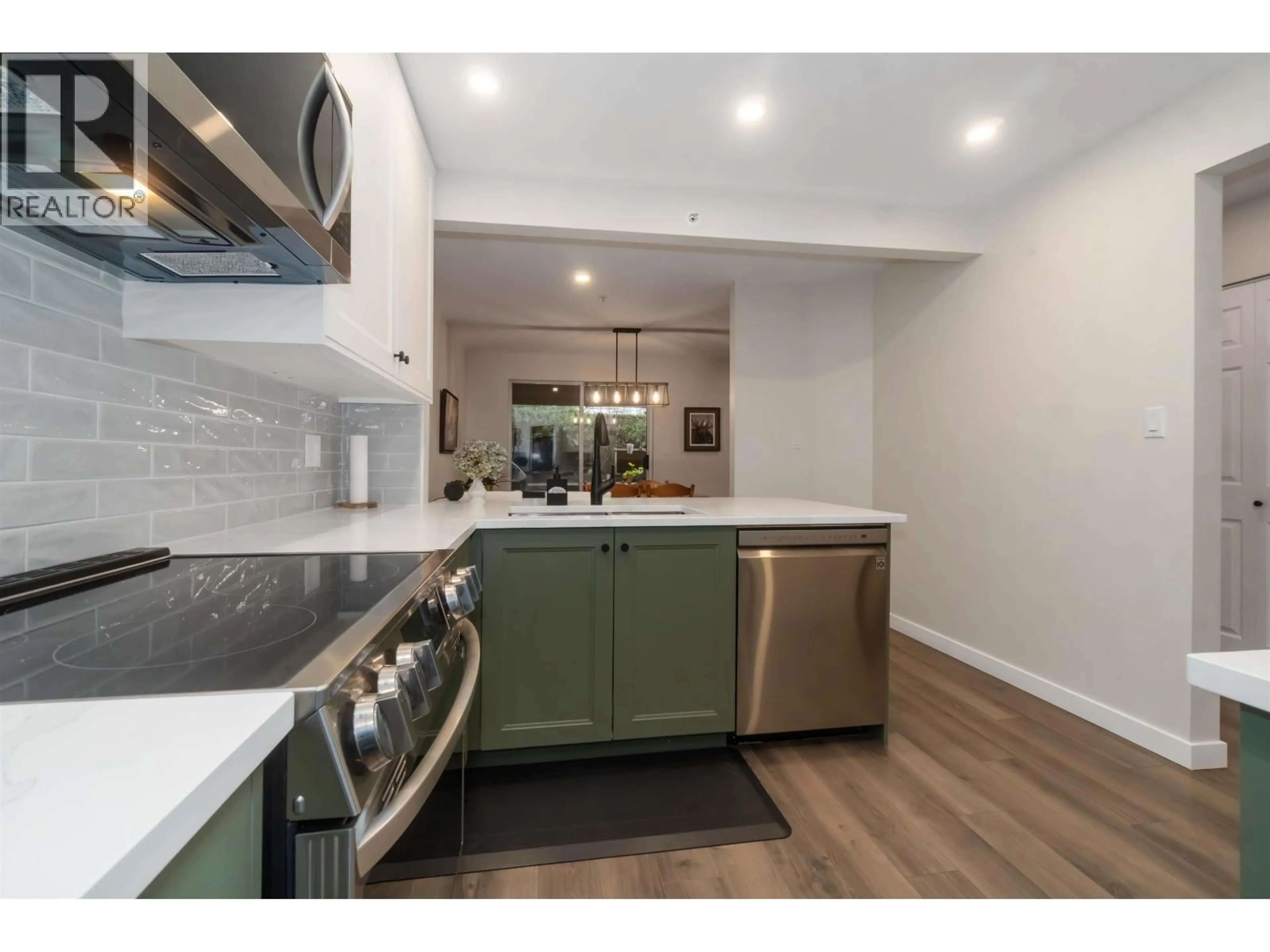 Open concept kitchen, unknown for 310 - 1000 BOWRON COURT, North Vancouver British Columbia V7H2V8