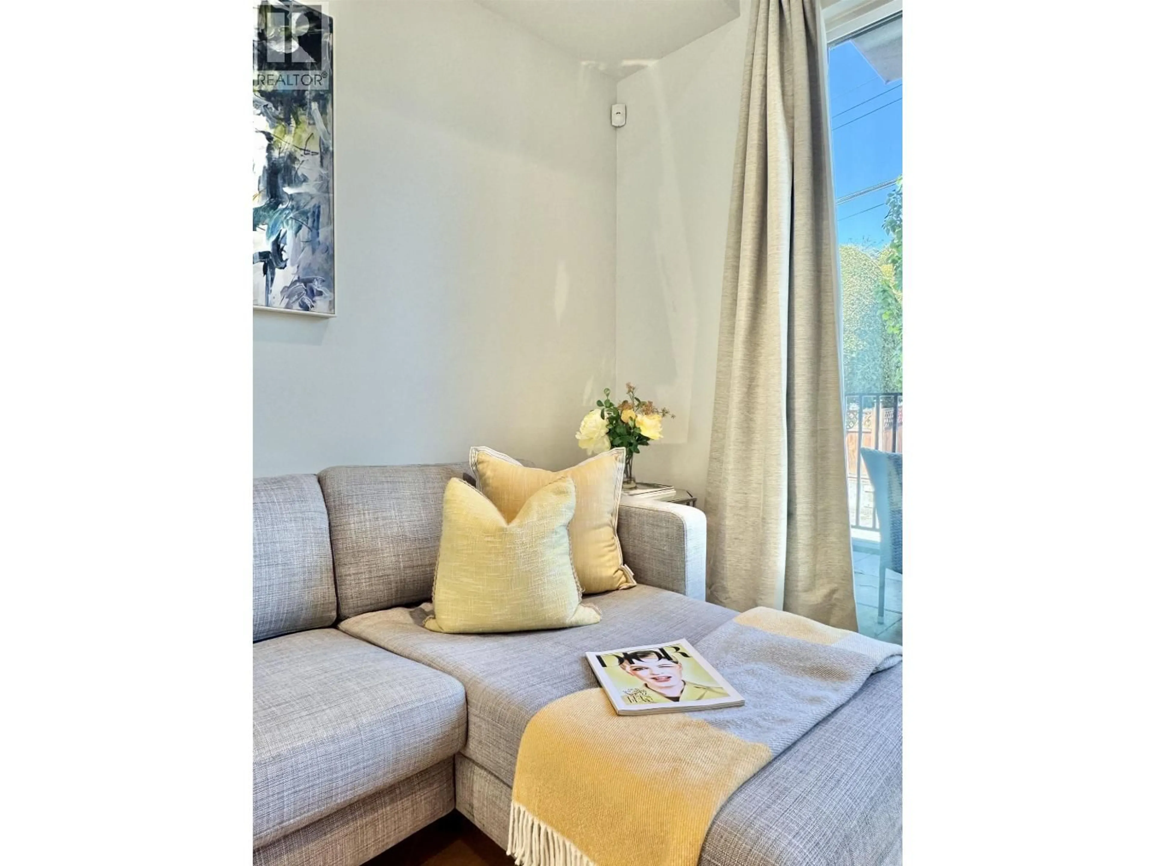 Living room with furniture, wood/laminate floor for 173 - 805 49TH AVENUE, Vancouver British Columbia V5Z0A1