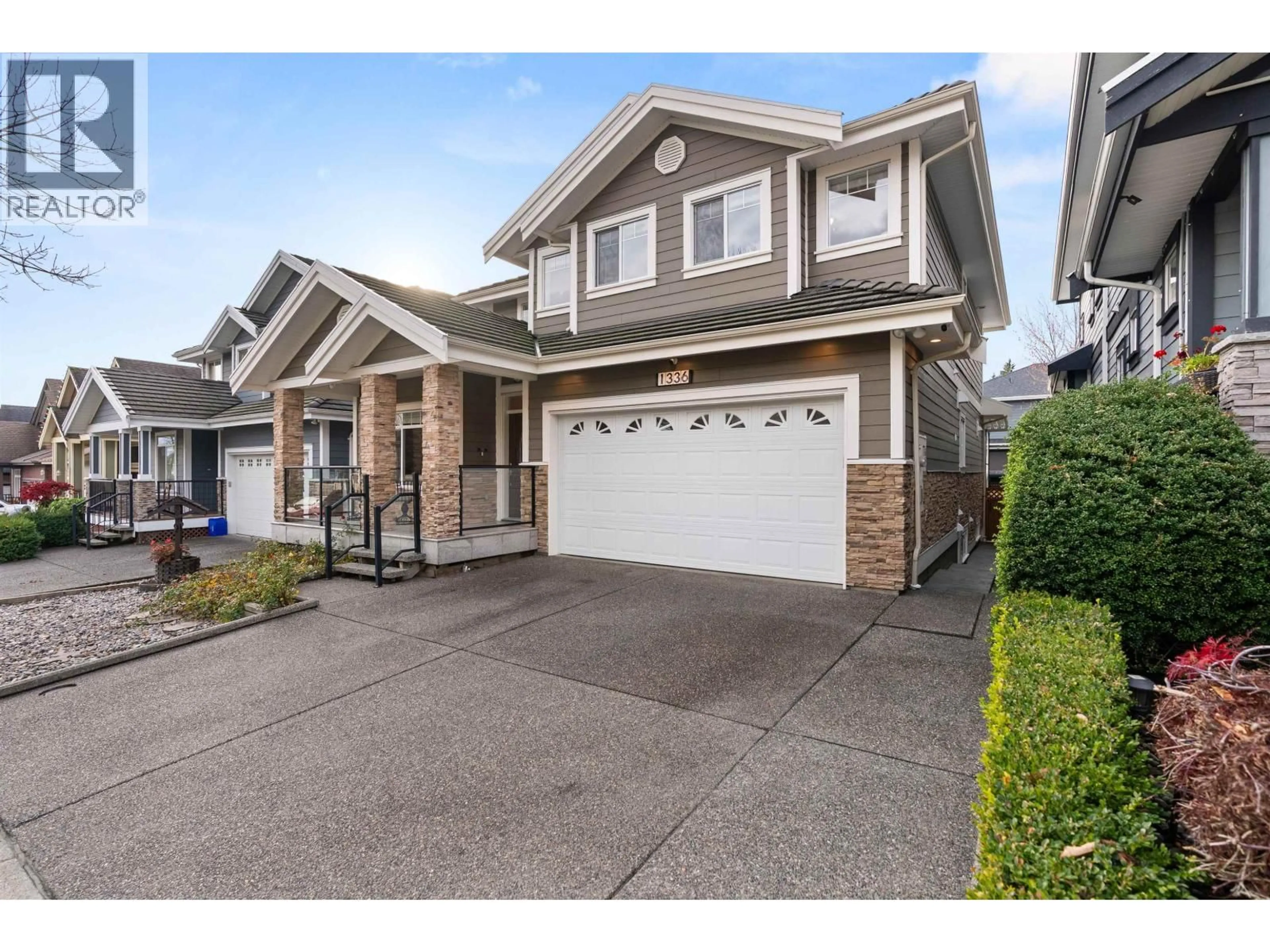 Home with vinyl exterior material, street for 1336 MARGUERITE STREET, Coquitlam British Columbia V3E0E1