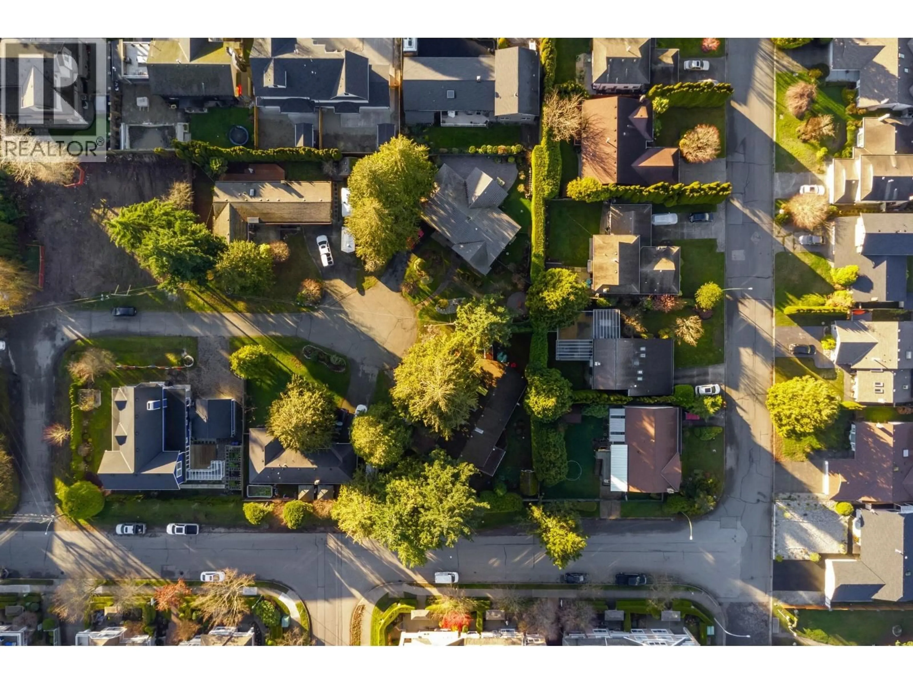 A pic from outside/outdoor area/front of a property/back of a property/a pic from drone, street for 5454 13A AVENUE, Delta British Columbia V4M3V5