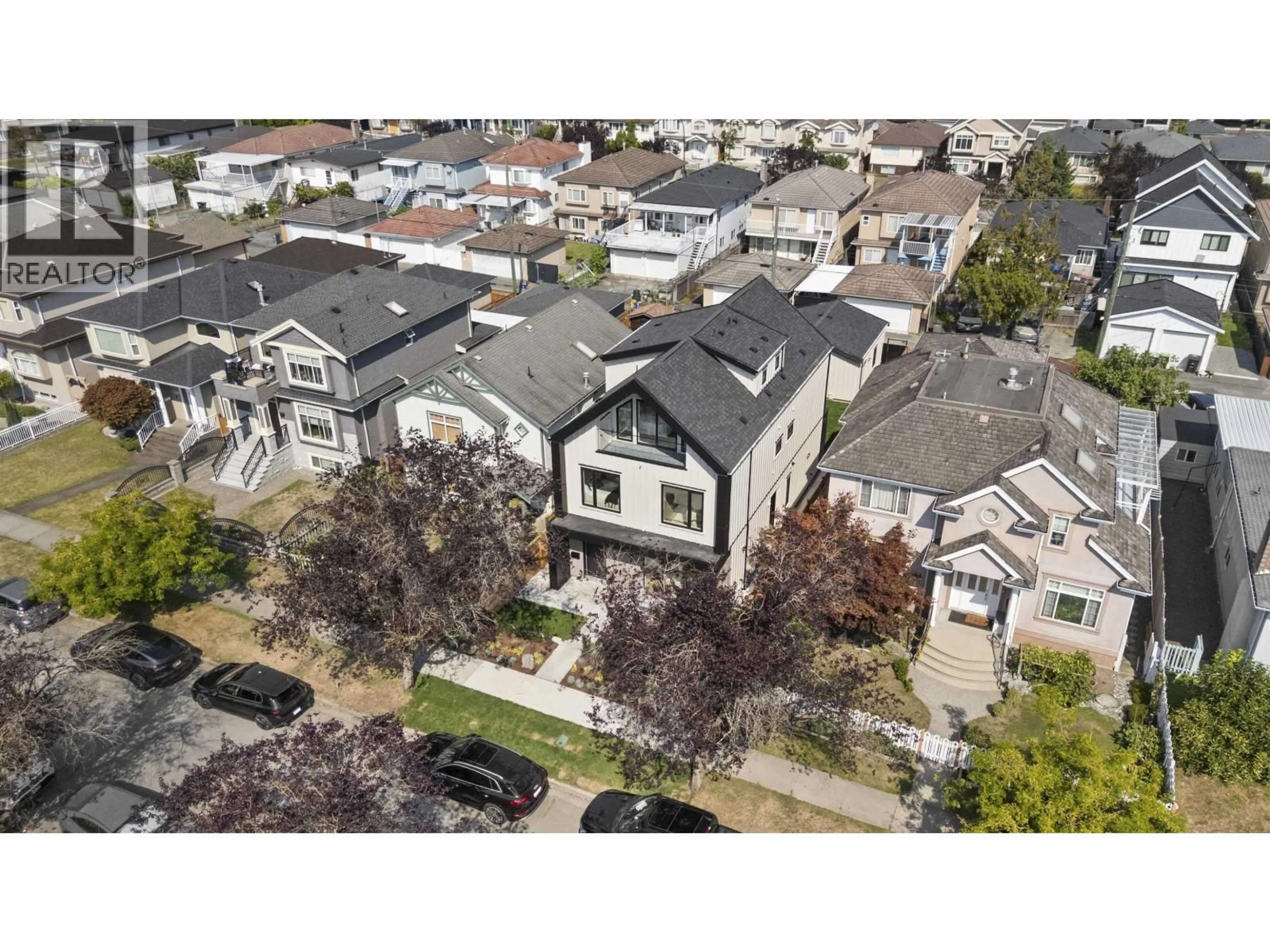 A pic from outside/outdoor area/front of a property/back of a property/a pic from drone, street for 1 - 3563 25TH AVENUE, Vancouver British Columbia V5R1K3