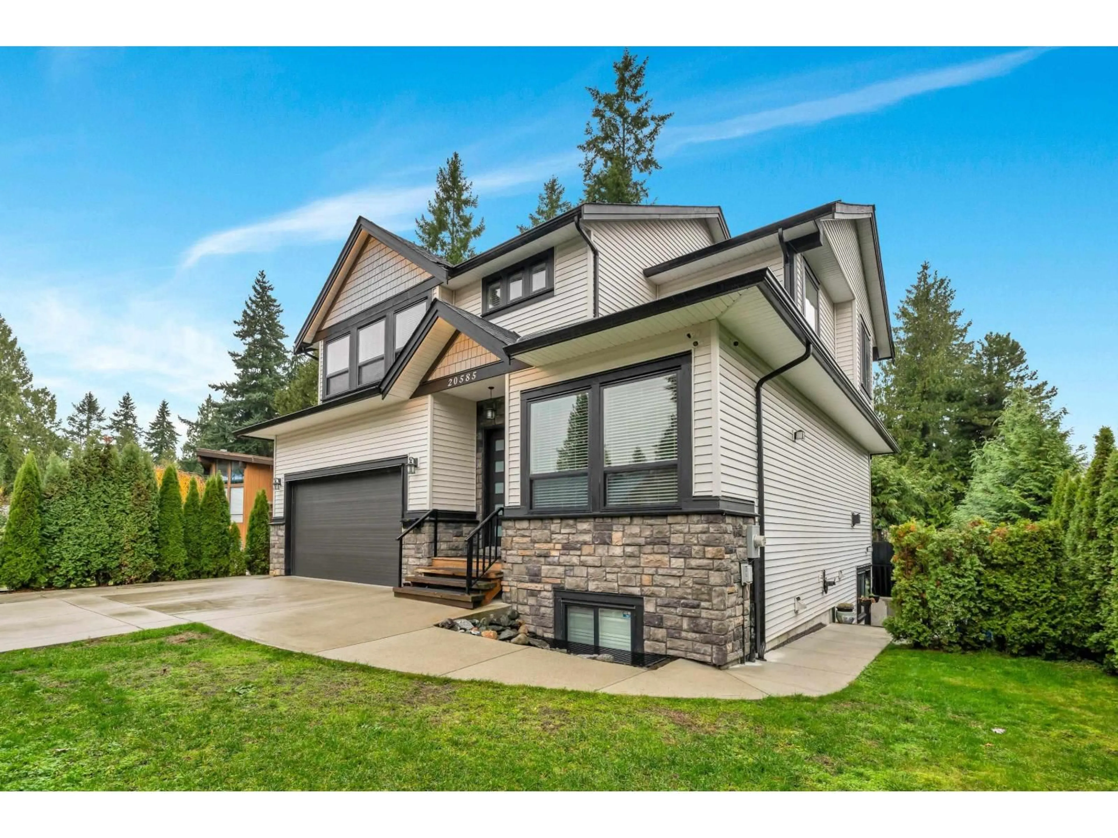 Home with vinyl exterior material, street for 20585 45A, Langley British Columbia V3A6G4