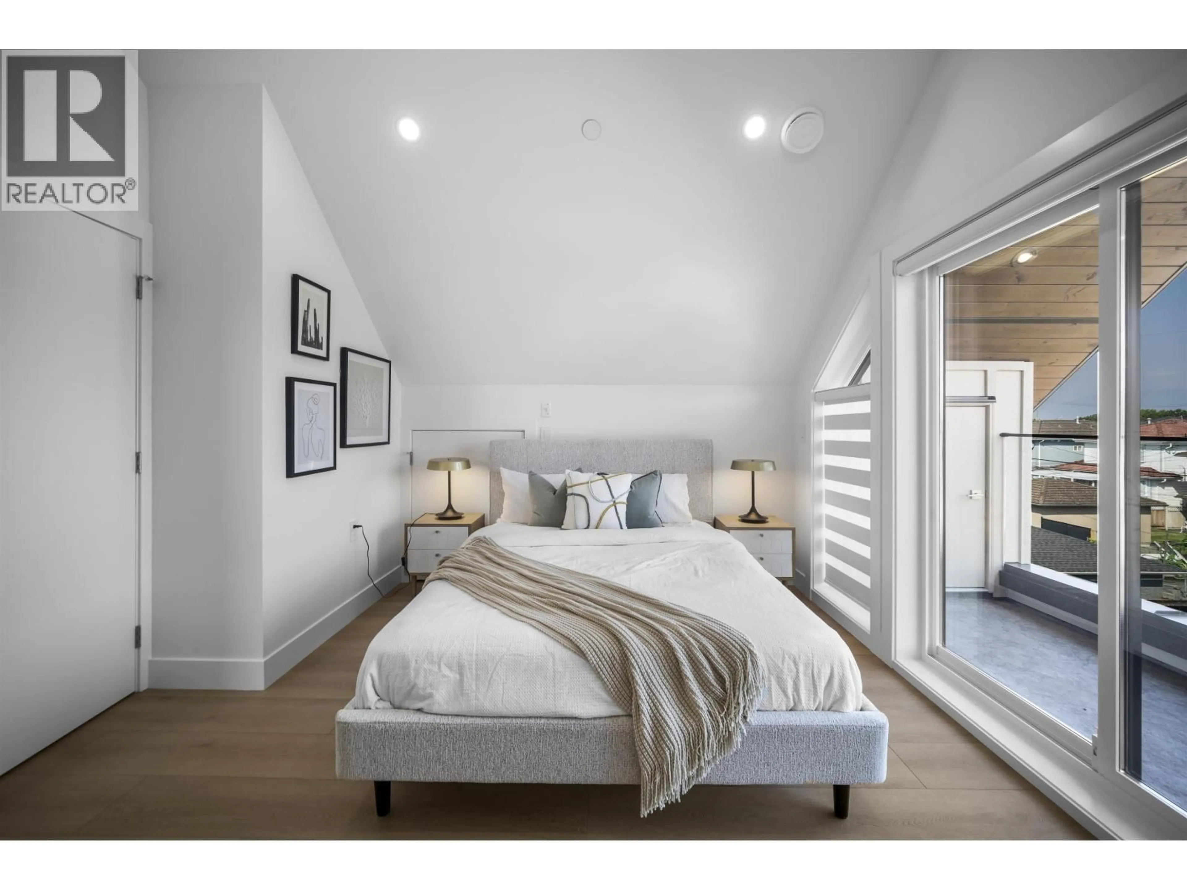 Bedroom with bed, wood/laminate floor for 2 - 3563 25TH AVENUE, Vancouver British Columbia V5R1K3