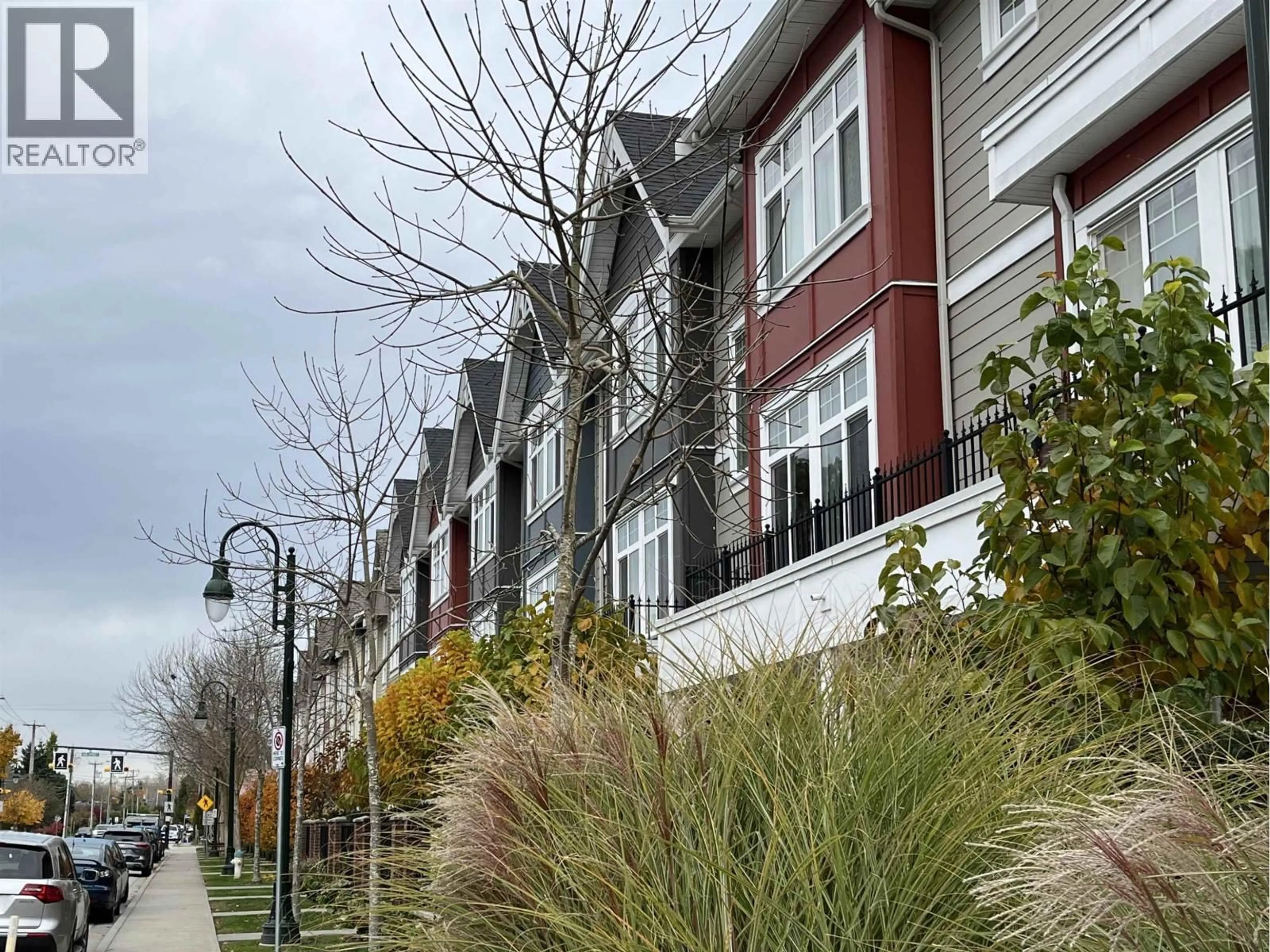 Home with vinyl exterior material, street for 4923 47A AVENUE, Ladner British Columbia V4K0E1