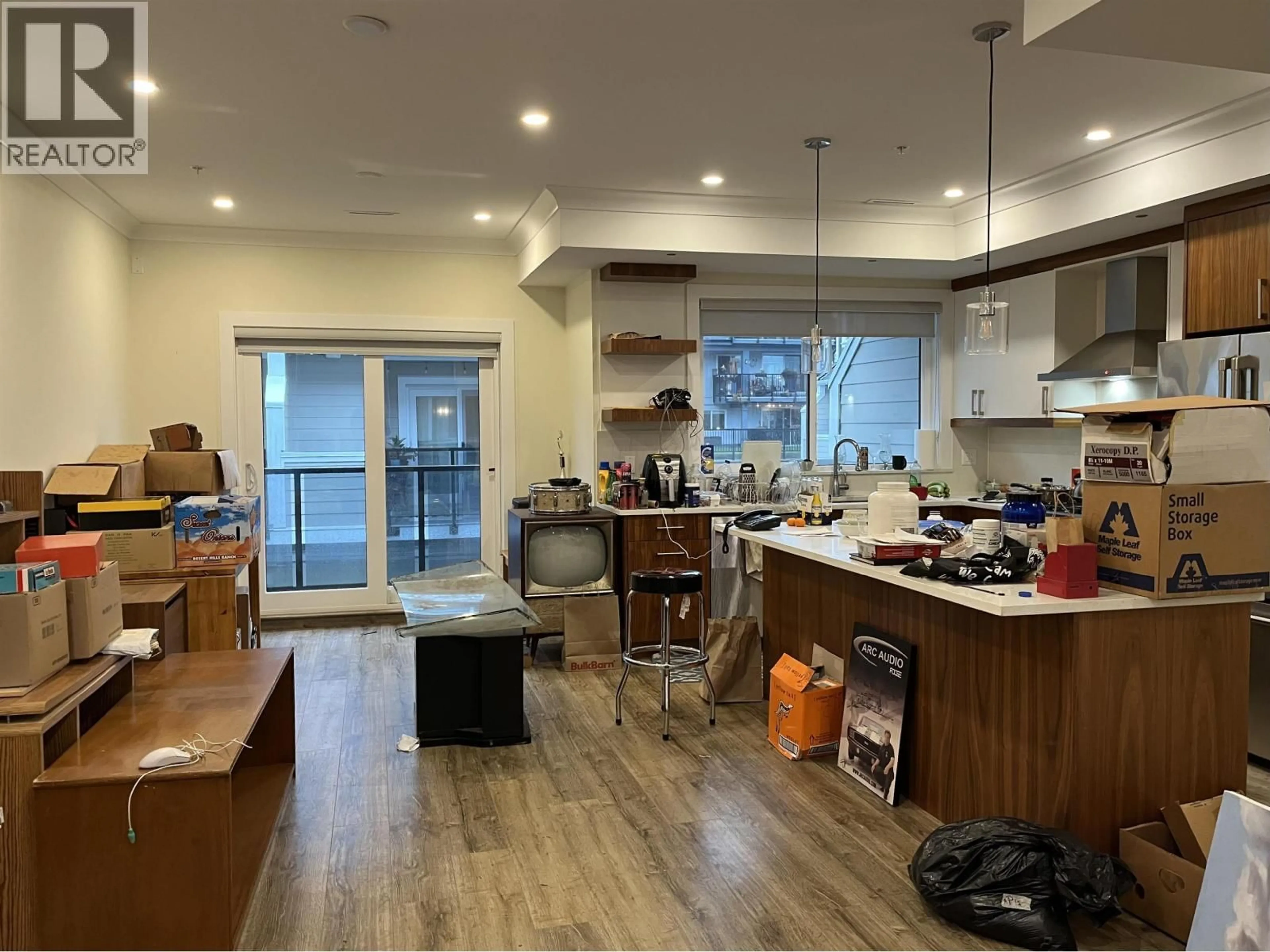 Open concept kitchen, wood/laminate floor for 4923 47A AVENUE, Ladner British Columbia V4K0E1