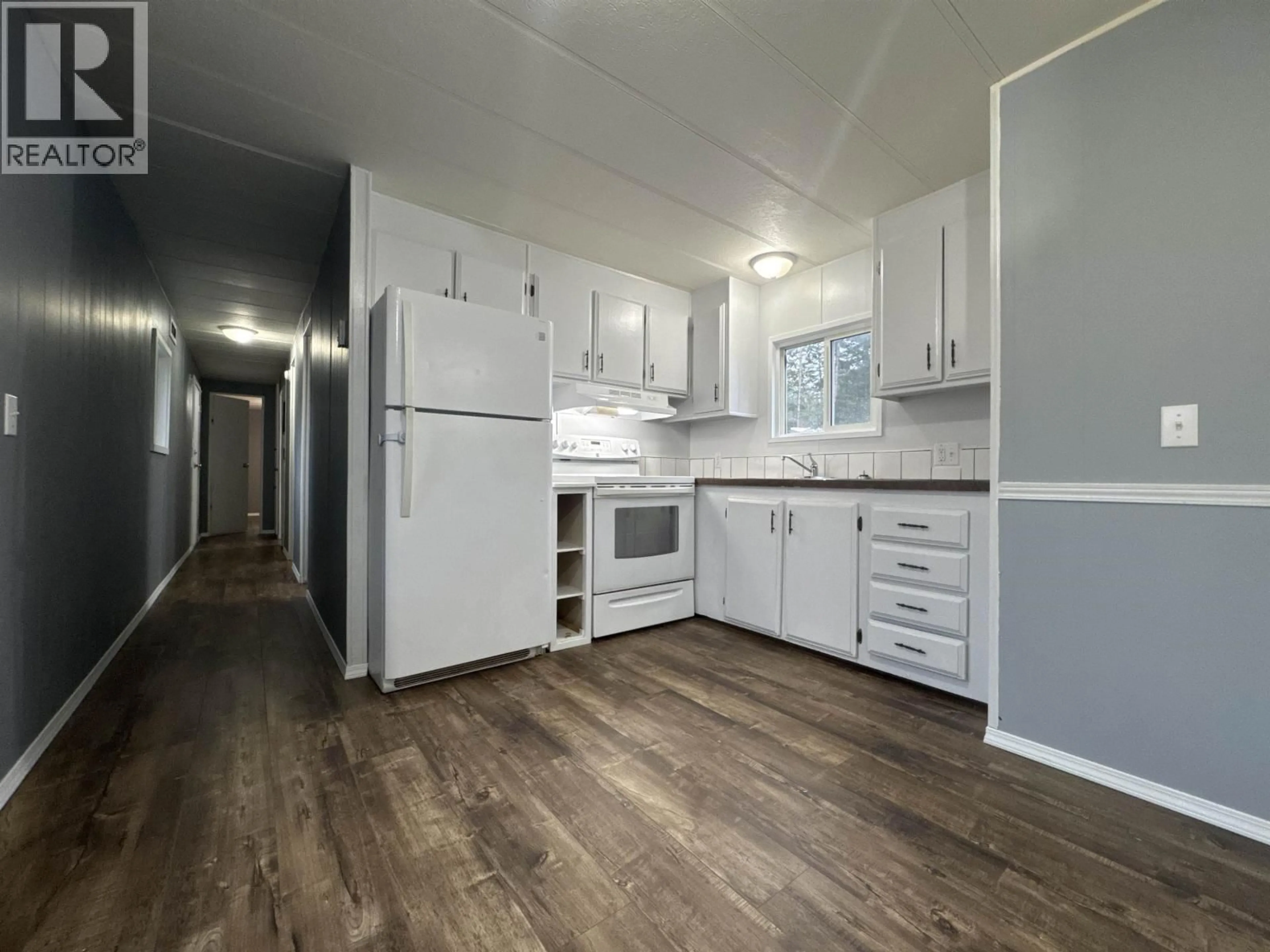 Standard kitchen, wood/laminate floor for 15 - 1427 DOG CREEK ROAD, Williams Lake British Columbia V2G3H3