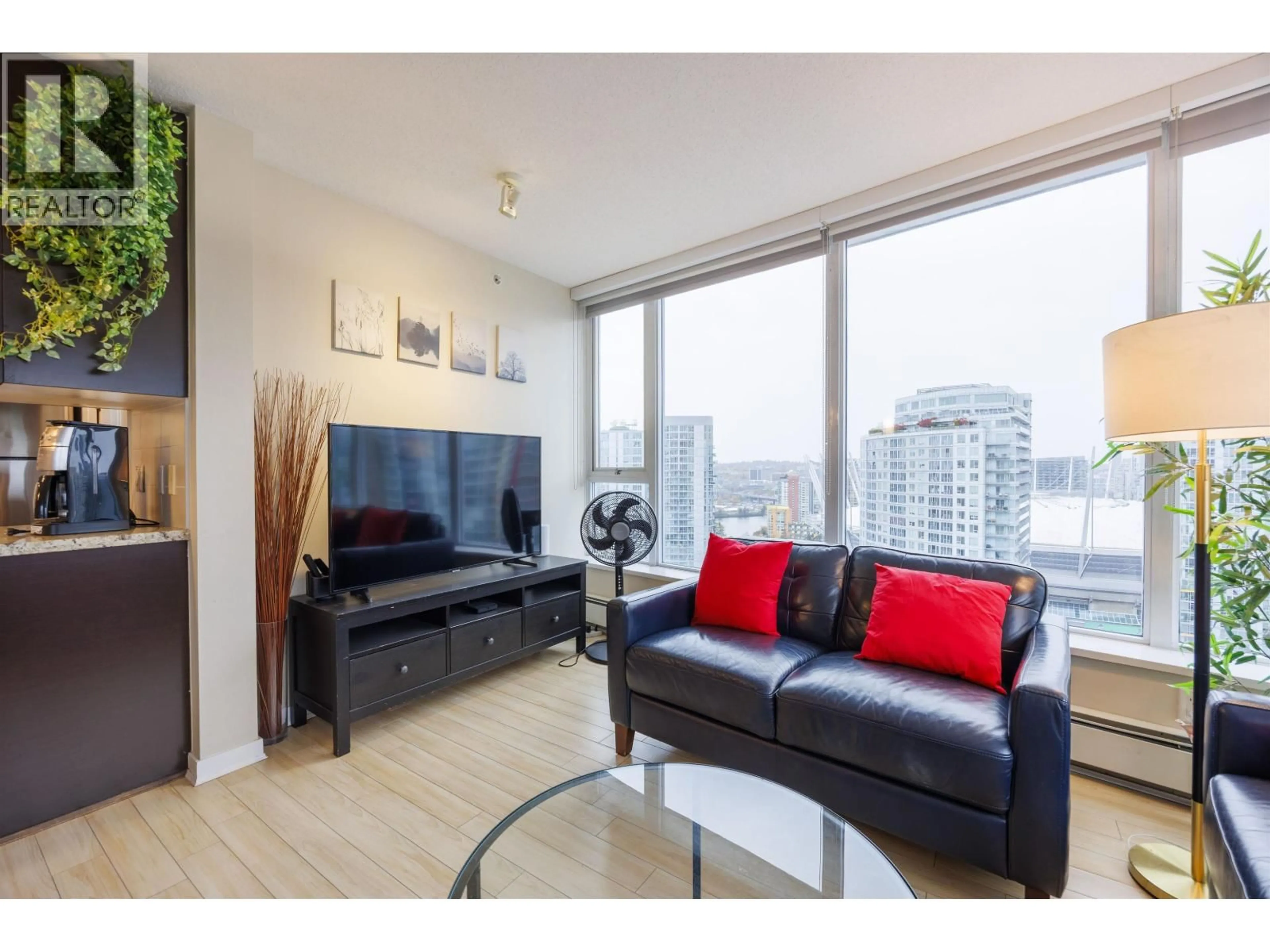 Living room with furniture, wood/laminate floor for 3207 - 689 ABBOTT STREET, Vancouver British Columbia V6B0J2