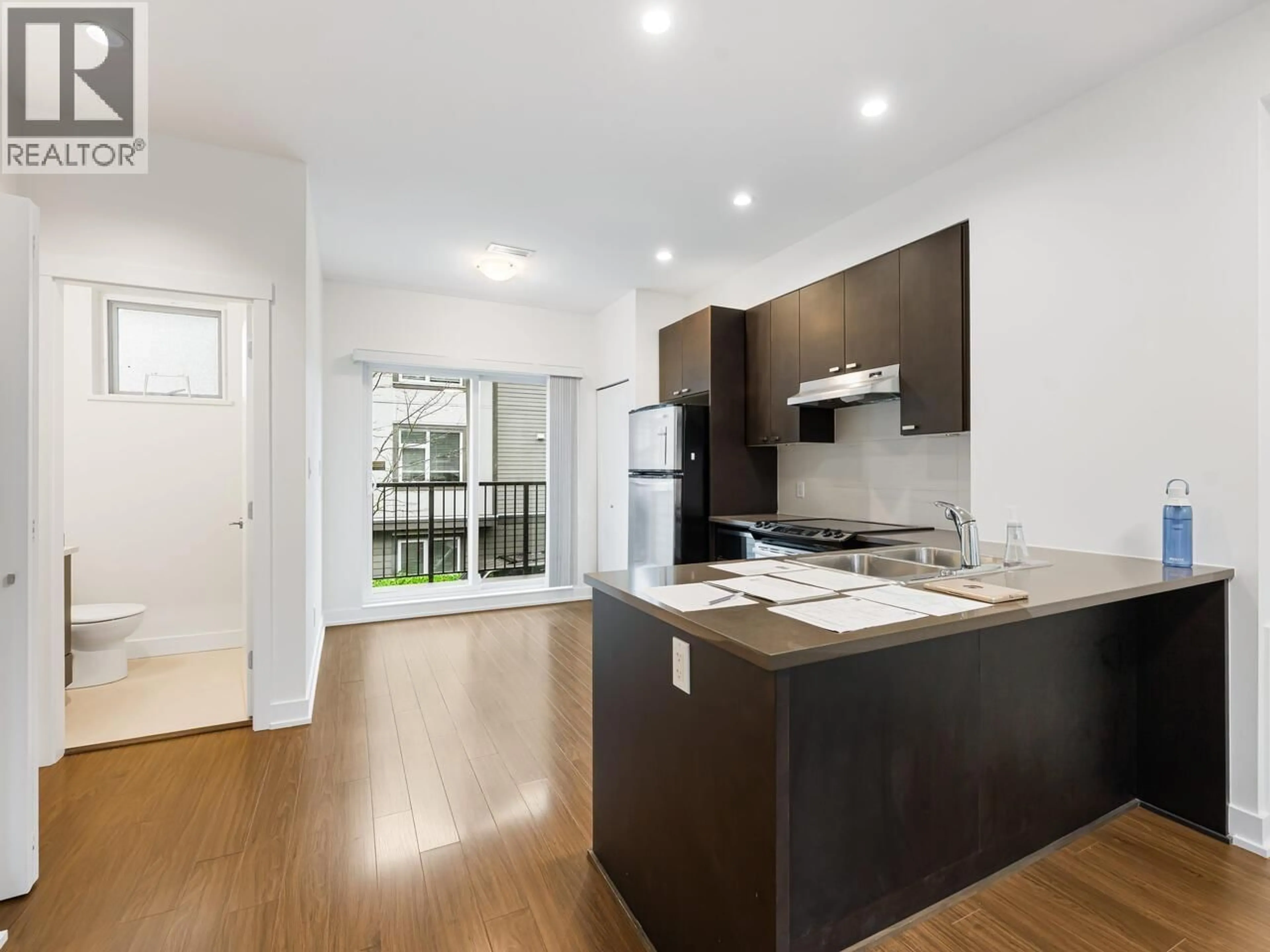 Standard kitchen, wood/laminate floor for 10 - 4099 NO. 4 ROAD, Richmond British Columbia V6X2M2