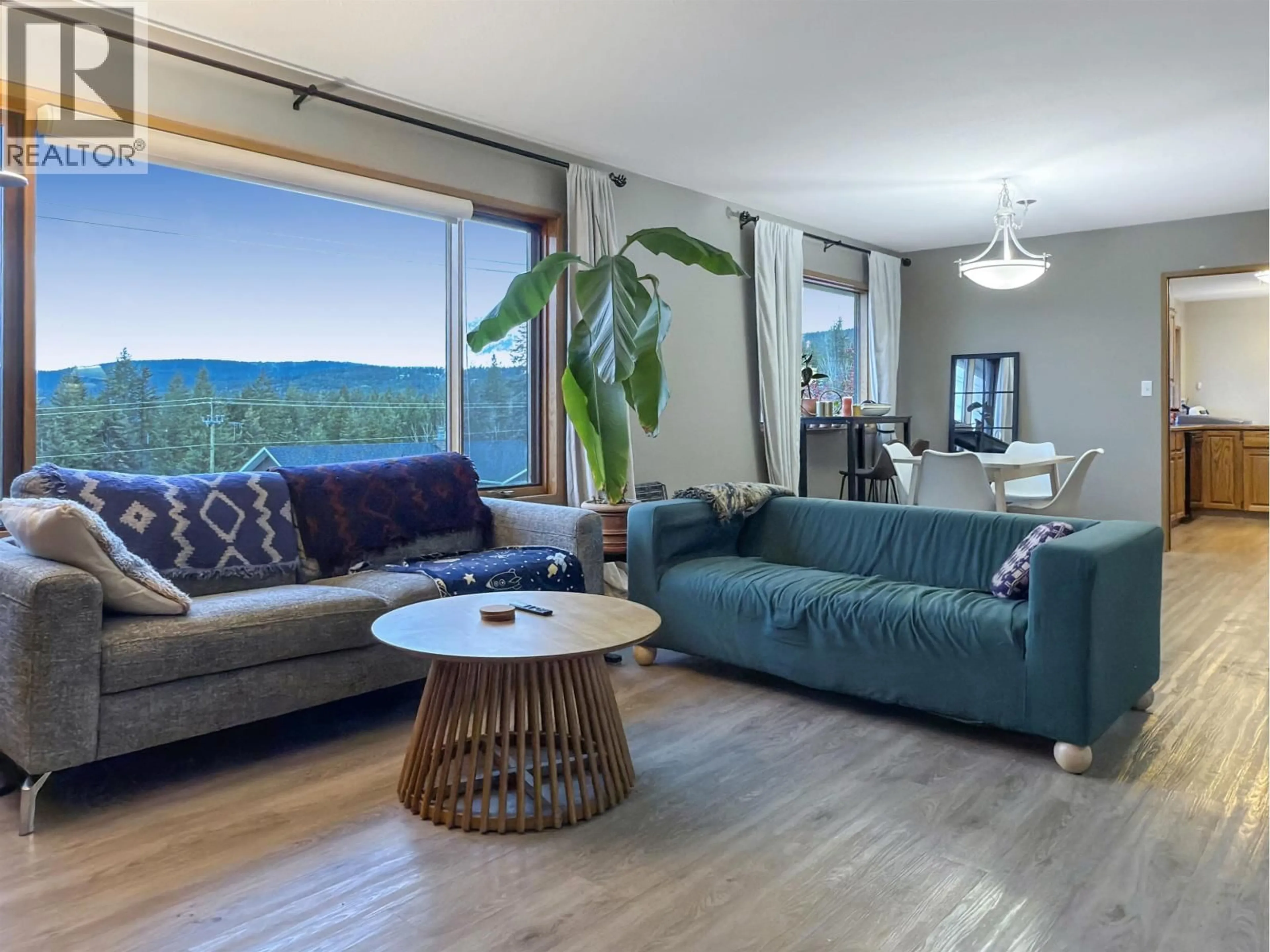 Living room with furniture, wood/laminate floor for 93 WESTRIDGE DRIVE, Williams Lake British Columbia V2G5K3