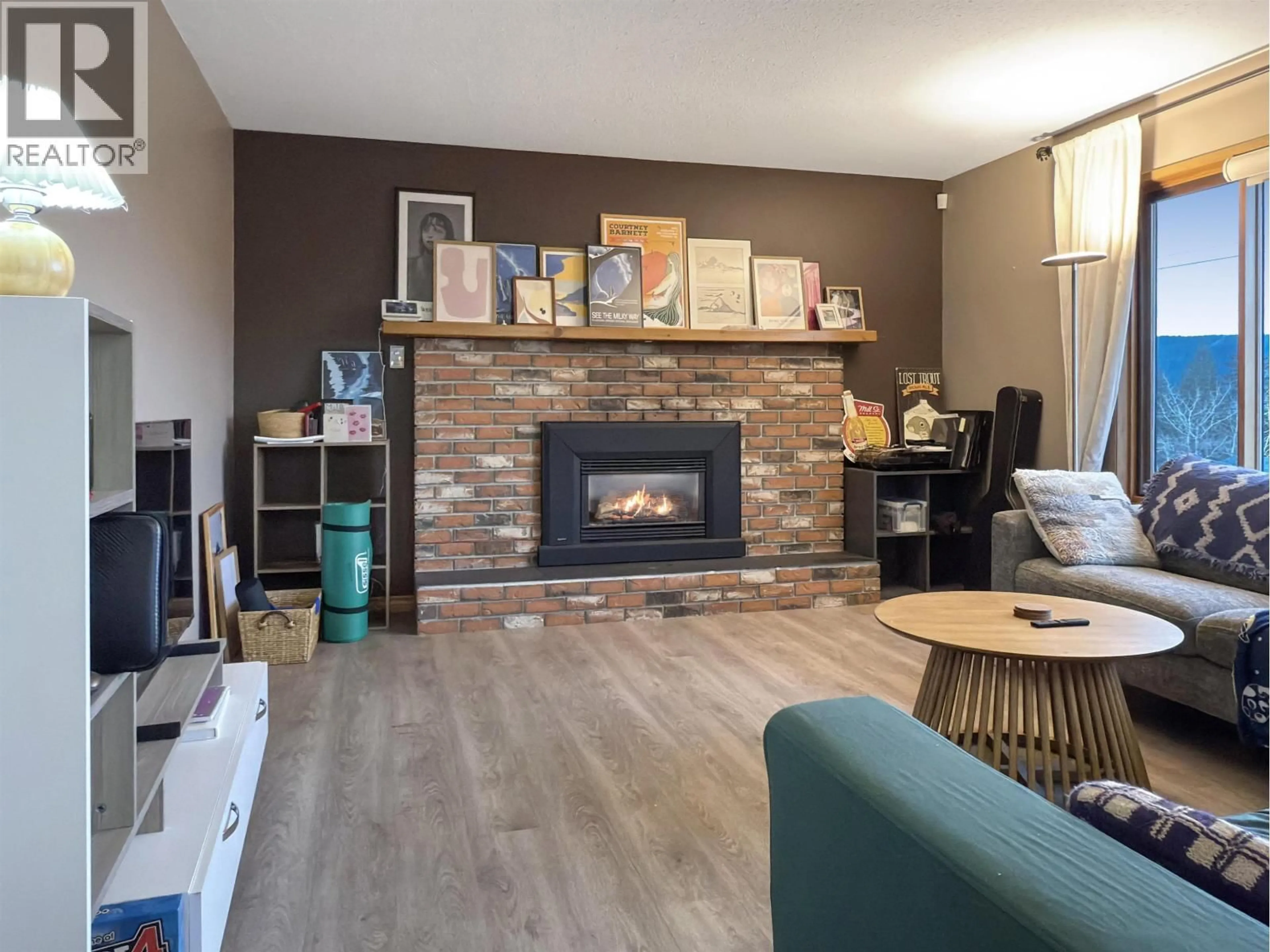 Living room with furniture, wood/laminate floor for 93 WESTRIDGE DRIVE, Williams Lake British Columbia V2G5K3