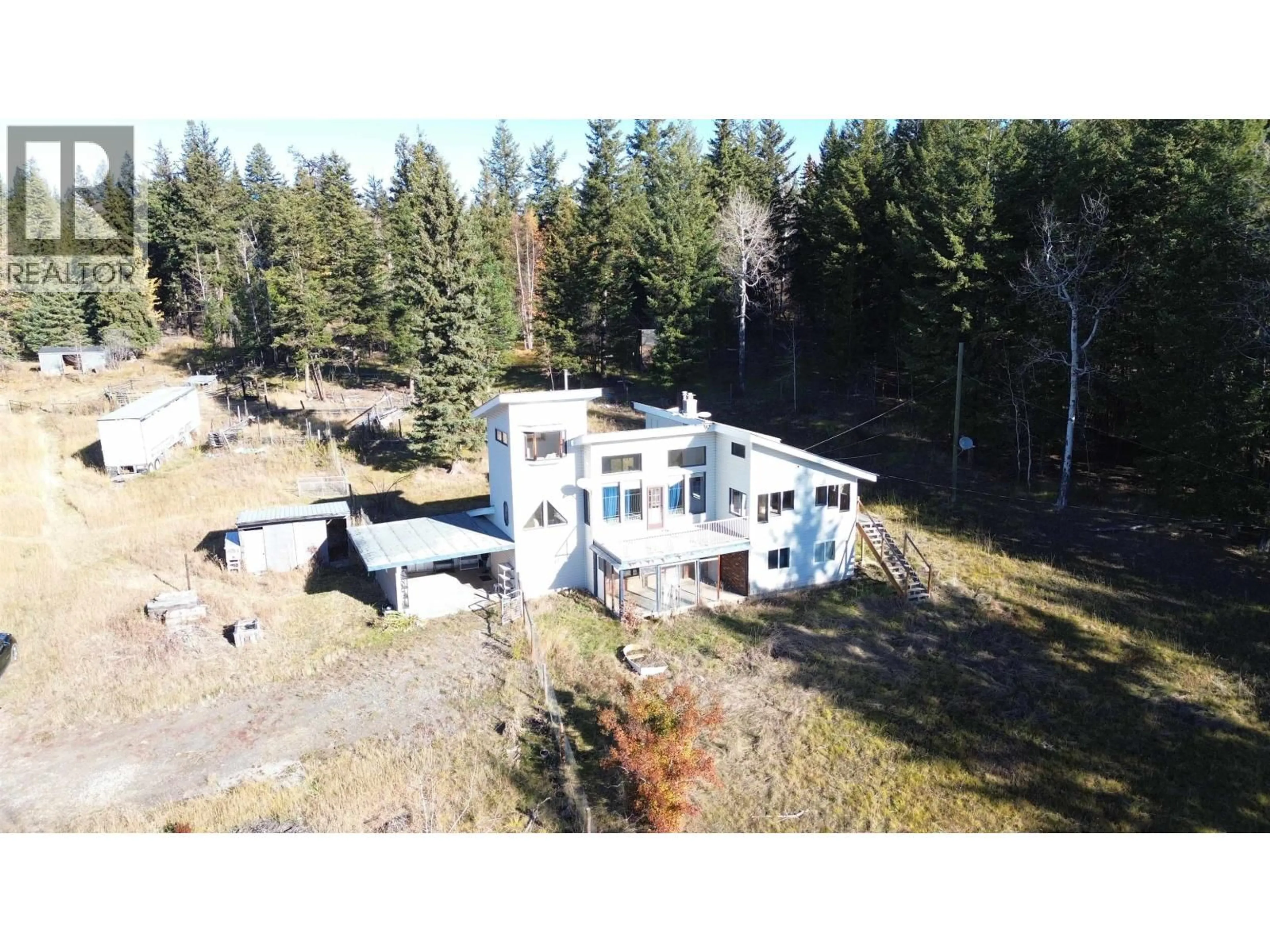 A pic from outside/outdoor area/front of a property/back of a property/a pic from drone, building for 2659 ROSE DRIVE, 150 Mile House British Columbia V0K2G0