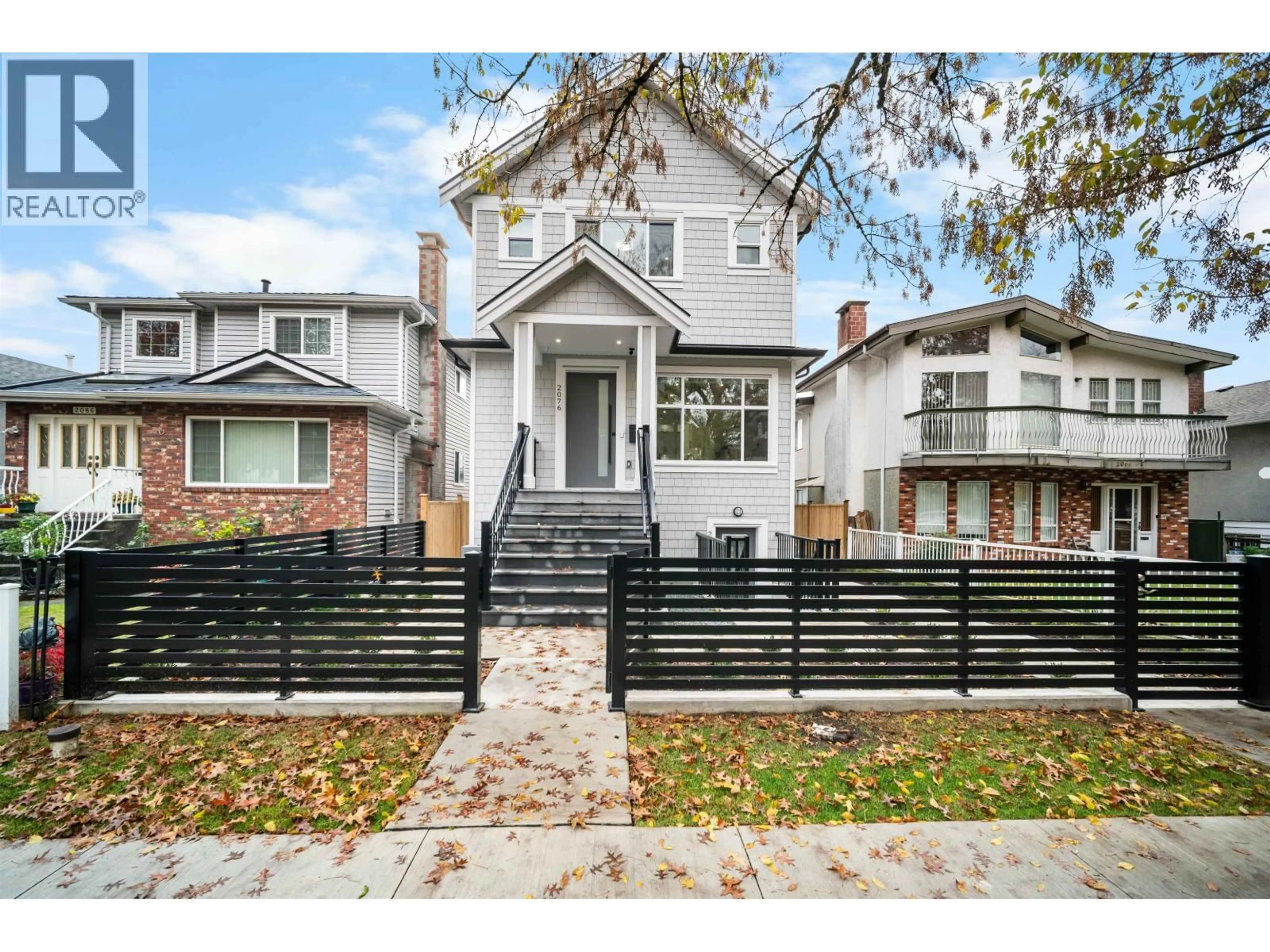 Home with brick exterior material, street for 2076 50TH AVENUE, Vancouver British Columbia V5P1V3