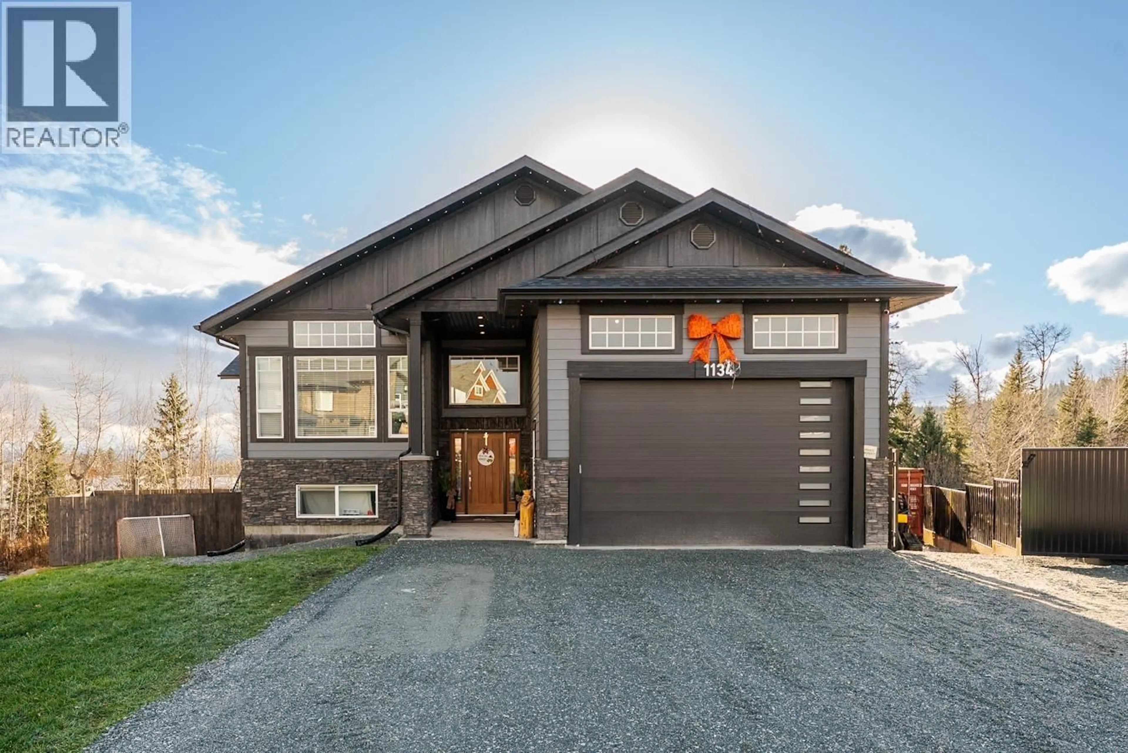 Home with brick exterior material, street for 1134 MONARCH COURT, Prince George British Columbia V2N0G8