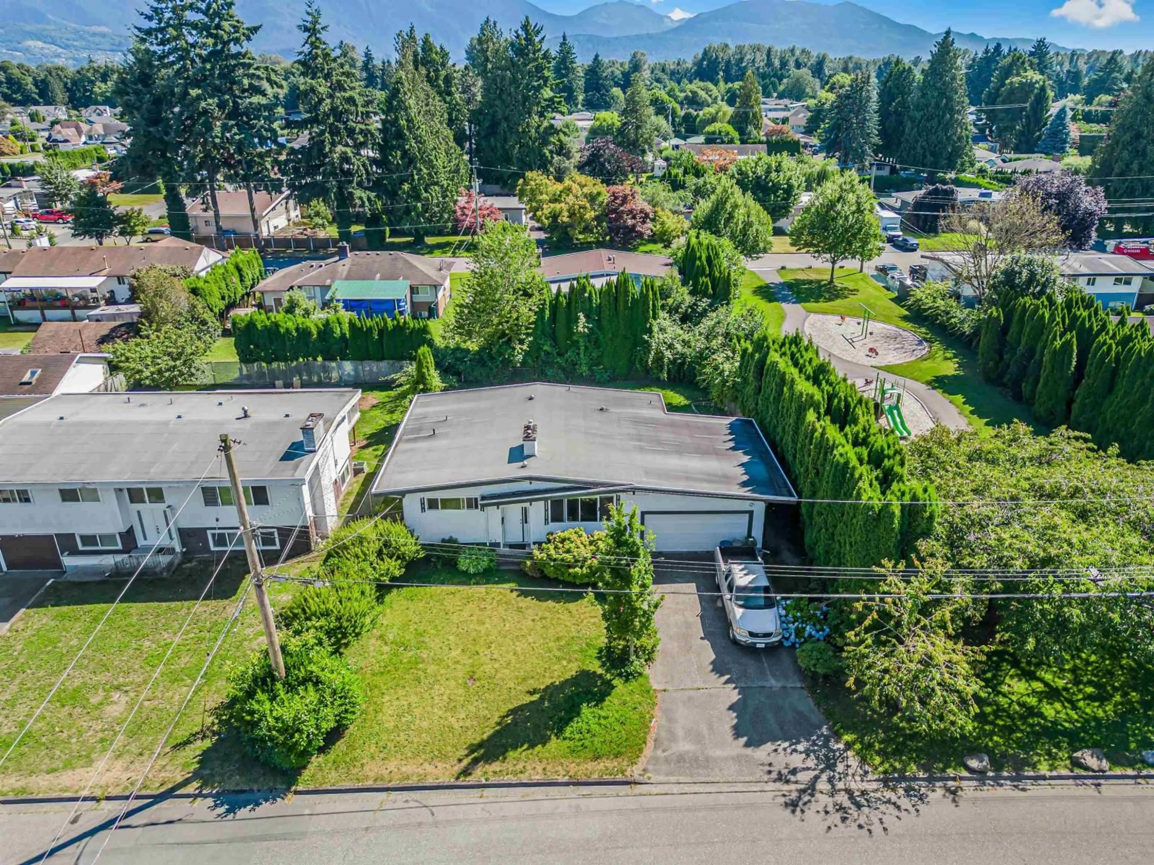 A pic from outside/outdoor area/front of a property/back of a property/a pic from drone, mountain view for 45410 WESTVIEW AVENUE, Chilliwack British Columbia V2P1M1
