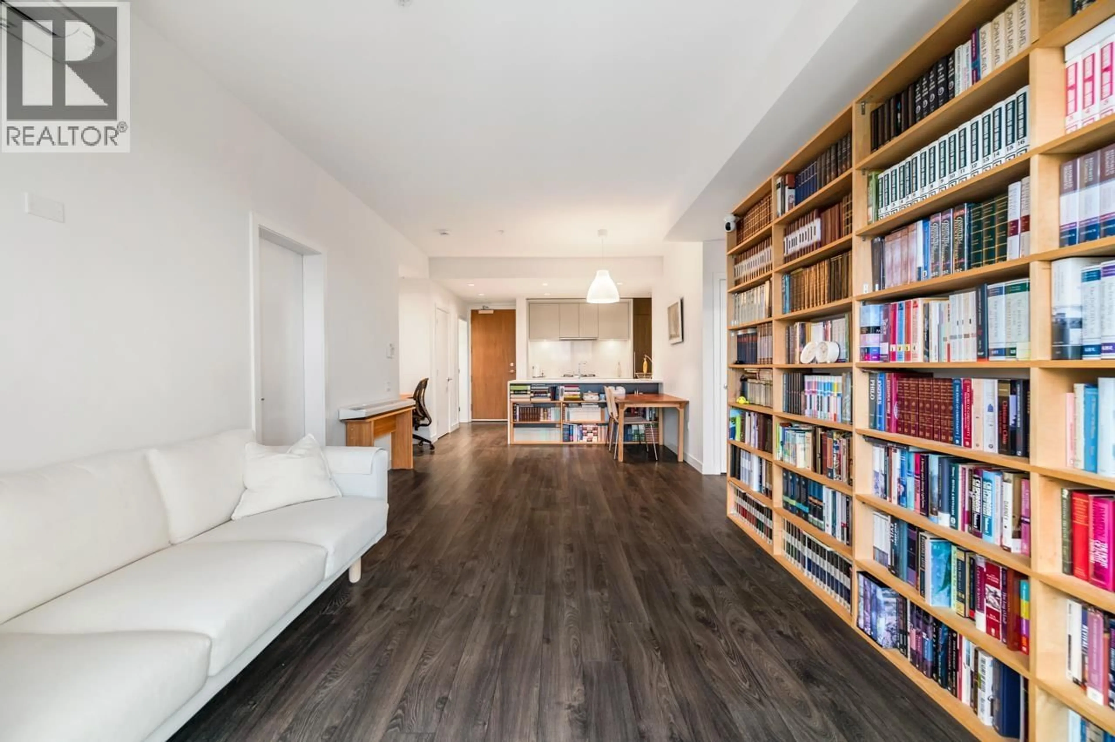 Living room with furniture, wood/laminate floor for PH6 - 6677 CAMBIE STREET, Vancouver British Columbia V6P0E6