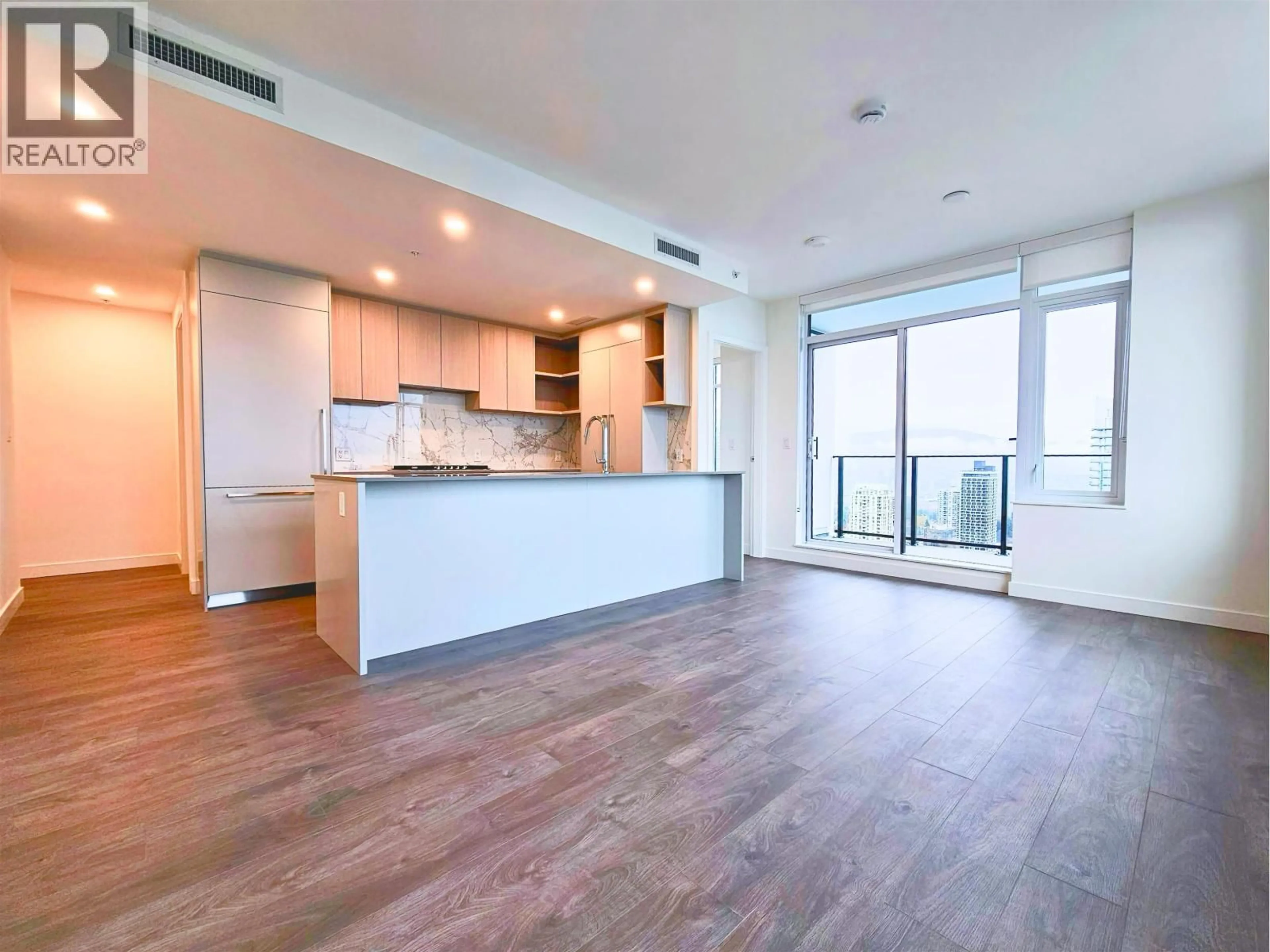 Open concept kitchen, wood/laminate floor for 3609 - 6468 WILLINGDON AVENUE, Burnaby British Columbia V5H0L3