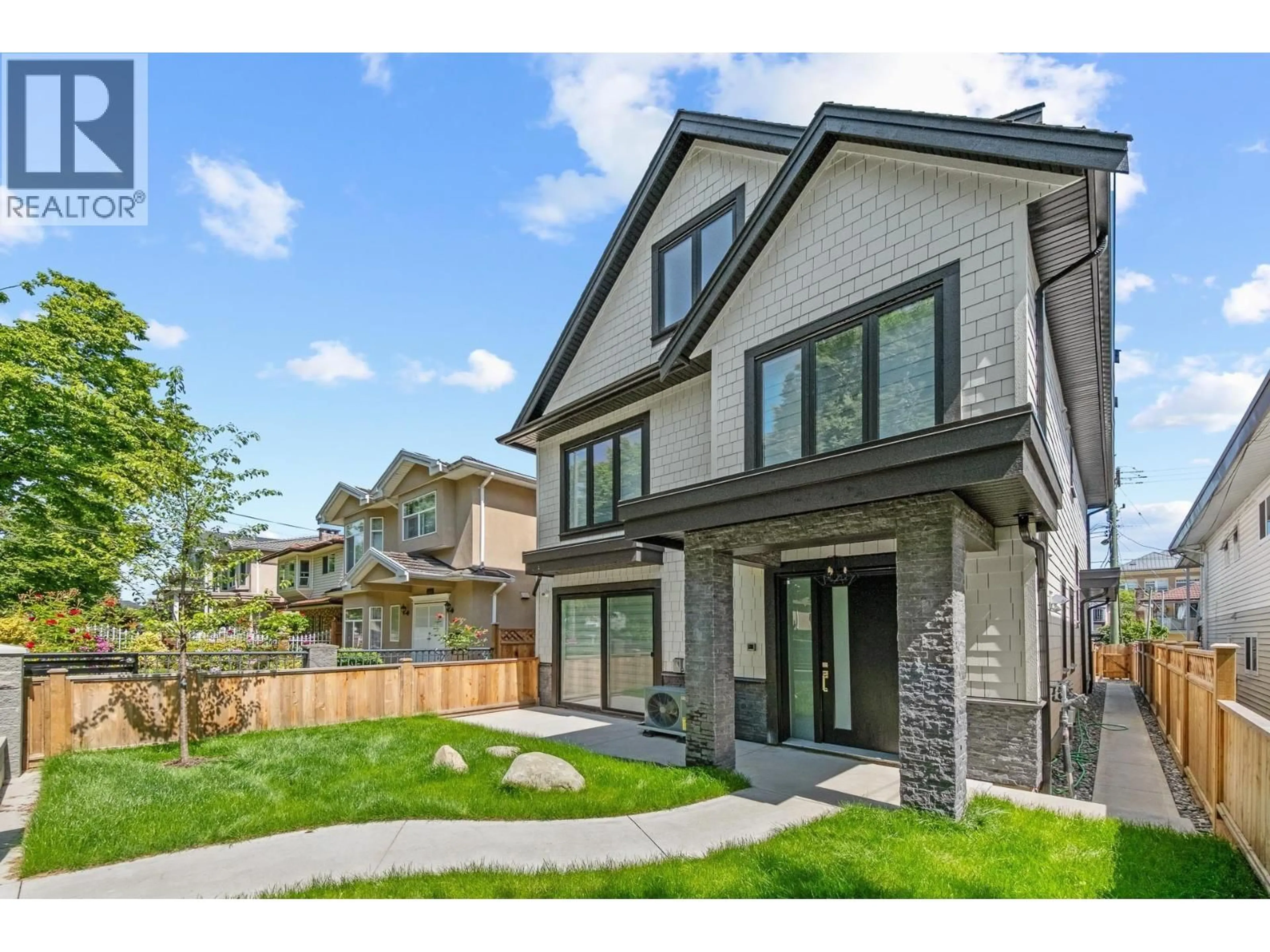 Home with brick exterior material, mountain view for 1 - 4650 GOTHARD STREET, Vancouver British Columbia V5R3K7