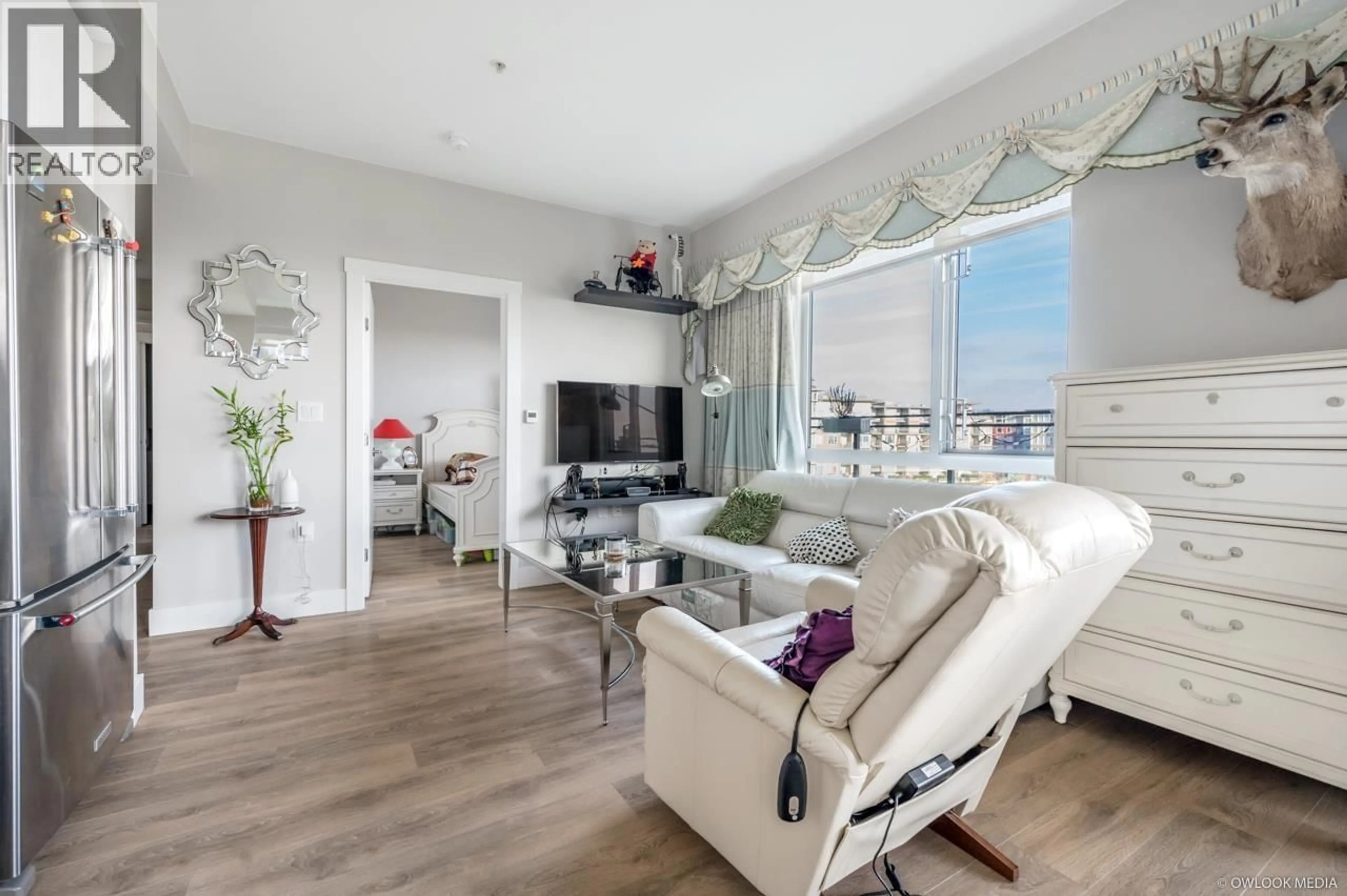 Living room with furniture, unknown for 605 - 3588 SAWMILL CRESCENT, Vancouver British Columbia V5S0H5