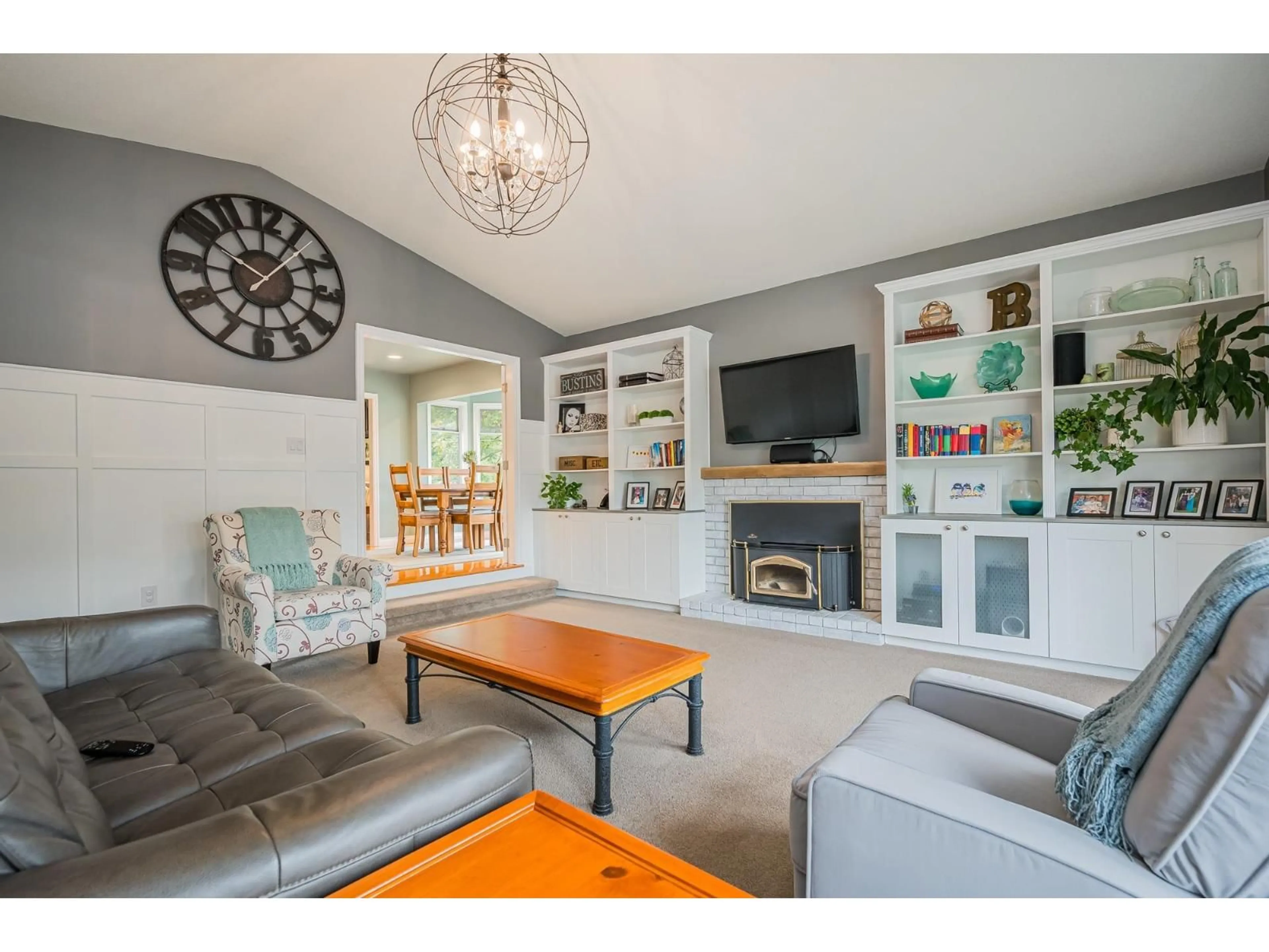 Living room with furniture, wood/laminate floor for 19810 20 AVENUE, Langley British Columbia V2Z1Z3
