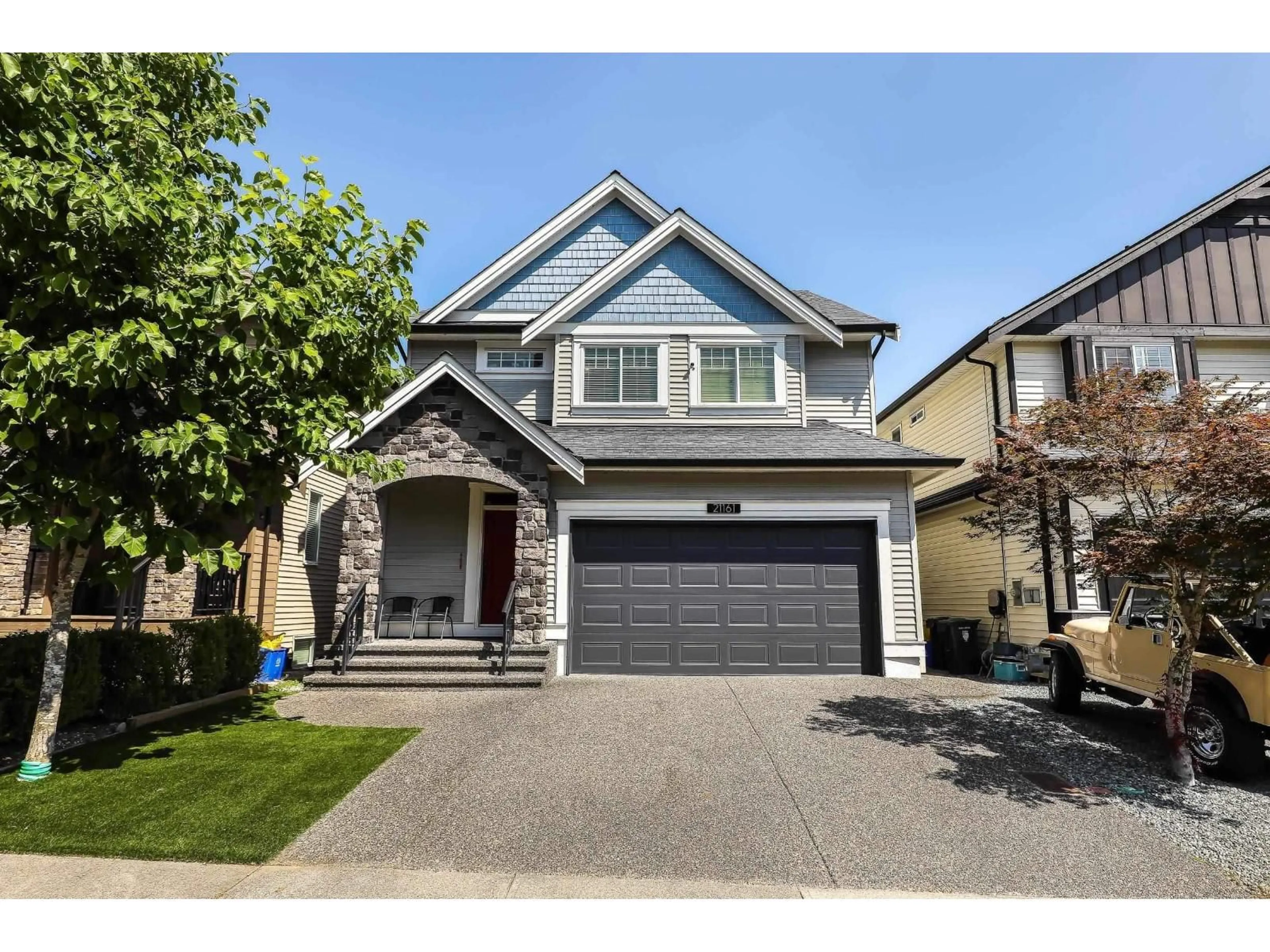 Home with vinyl exterior material, street for 21161 80A, Langley British Columbia V2Y0K3