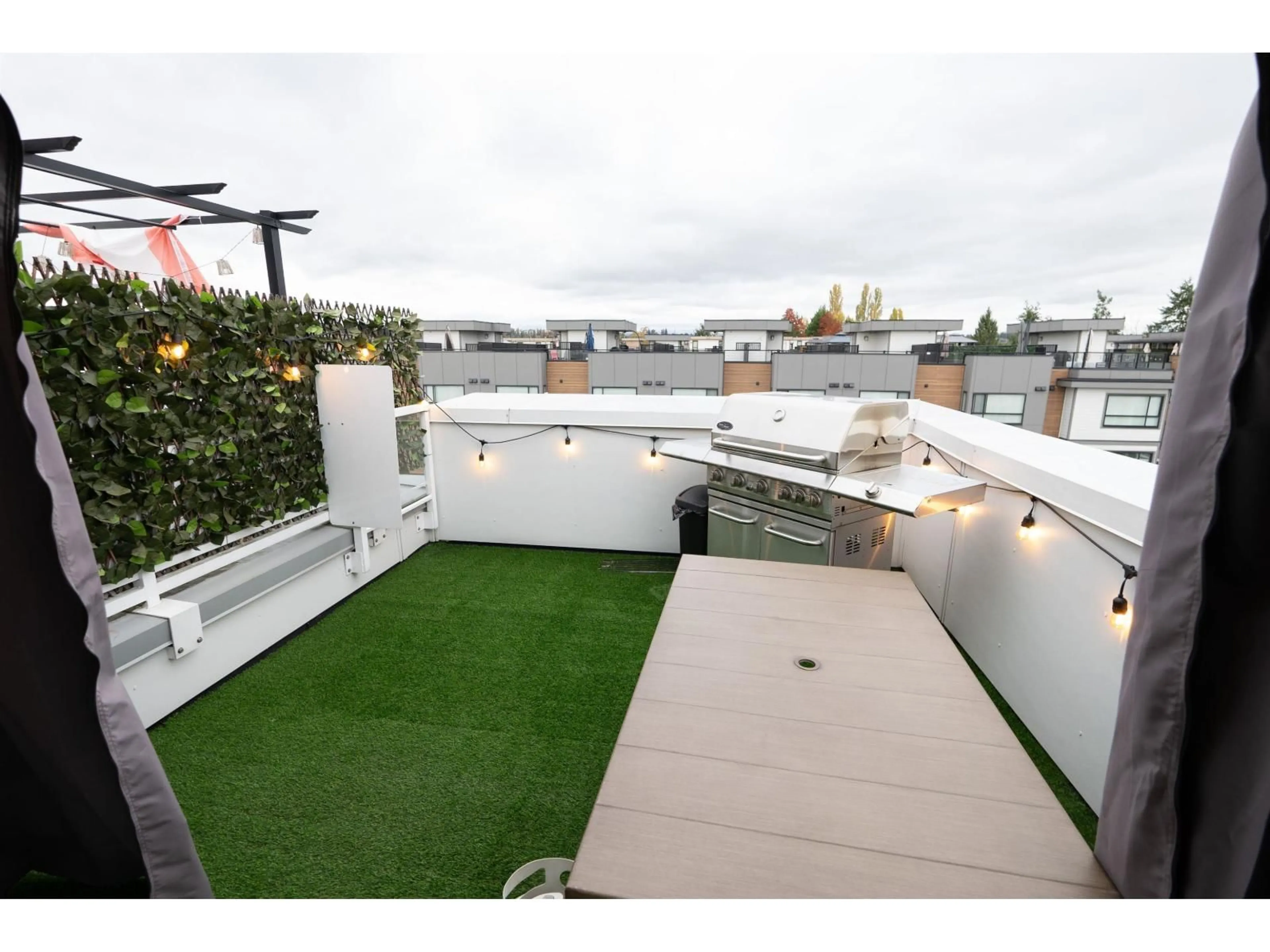 Patio, city buildings view from balcony for 6 - 19628 55A, Langley British Columbia V3A0M6