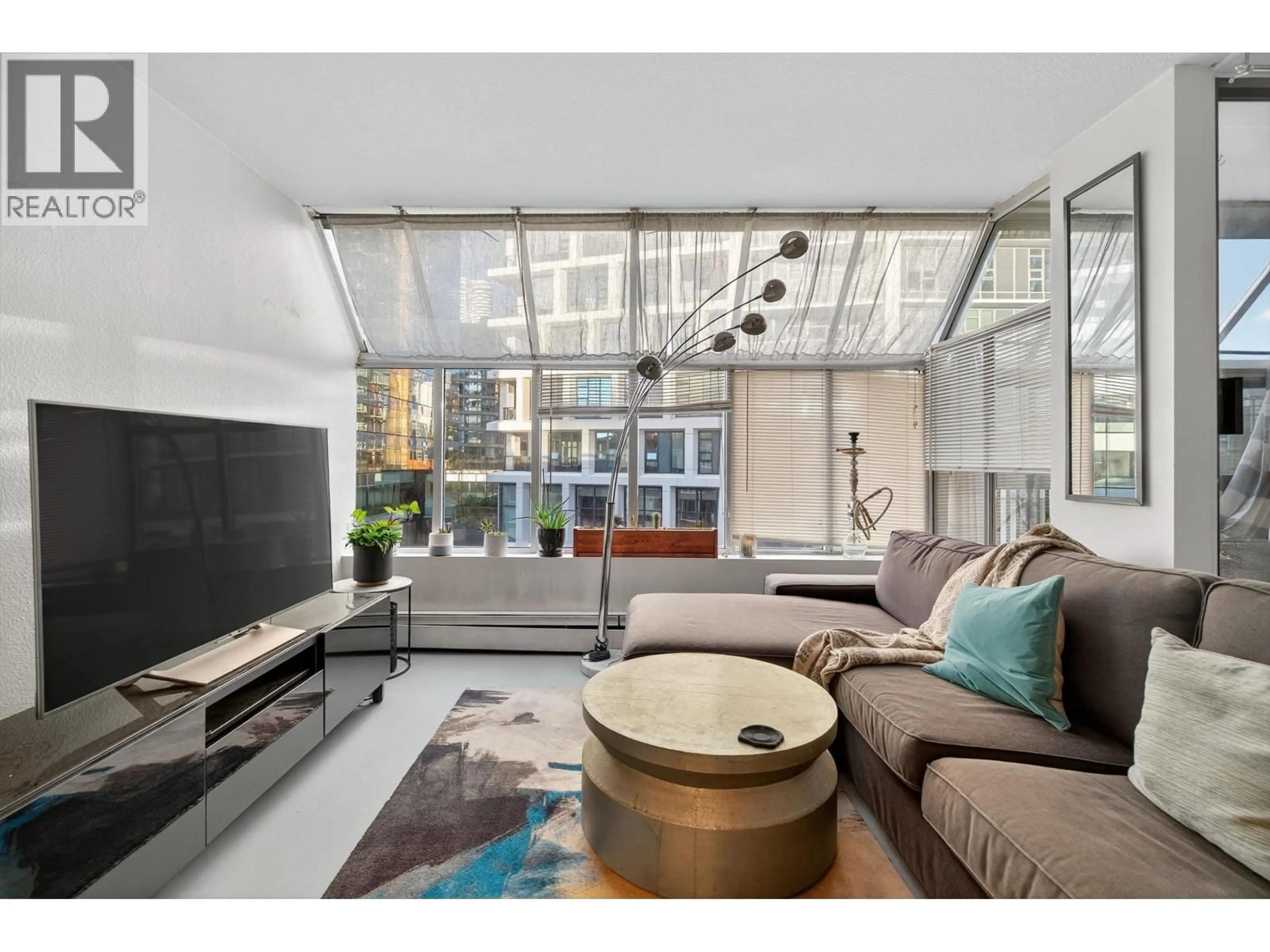 Living room with furniture, unknown for 902 - 950 DRAKE STREET, Vancouver British Columbia V6Z2B9