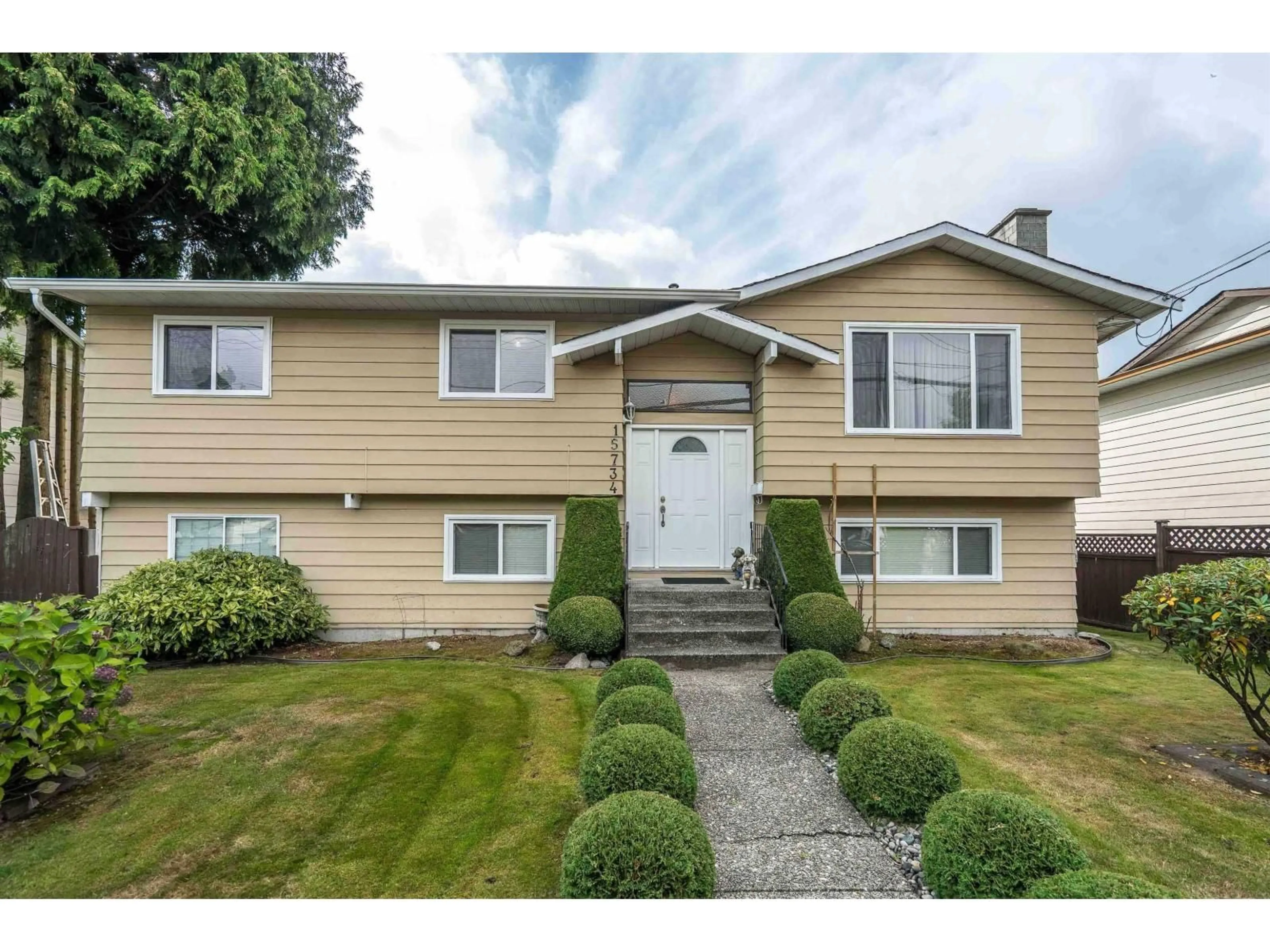 Home with vinyl exterior material, street for 15734 96, Surrey British Columbia V4N2L2