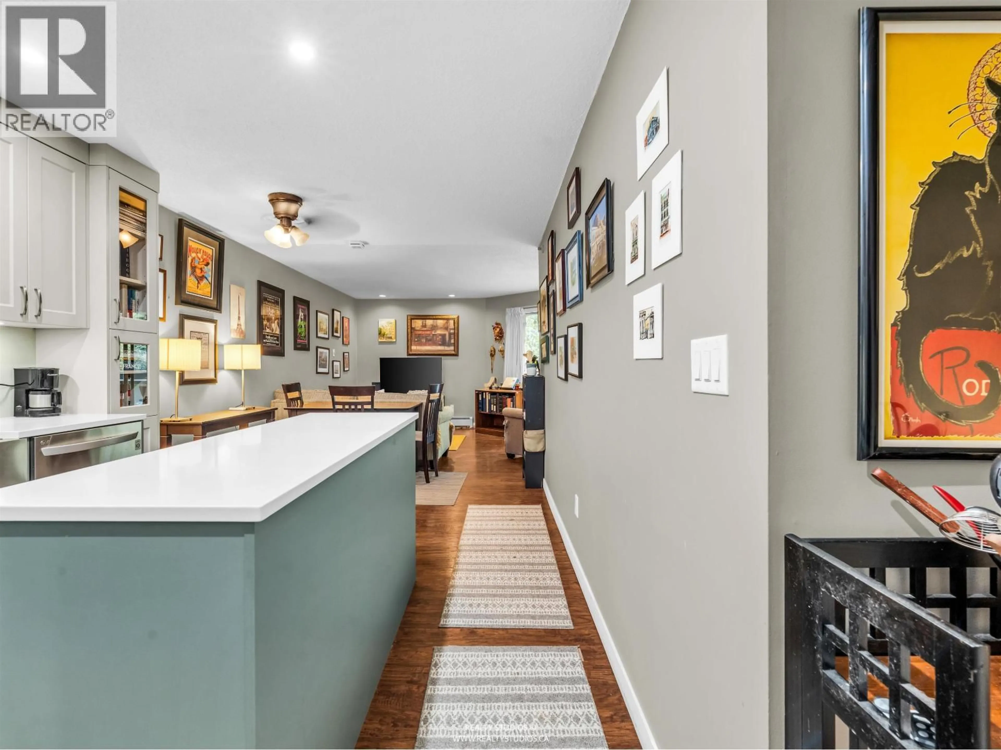 Open concept kitchen, ceramic/tile floor for 319 - 1500 PENDRELL STREET, Vancouver British Columbia V6G3A5