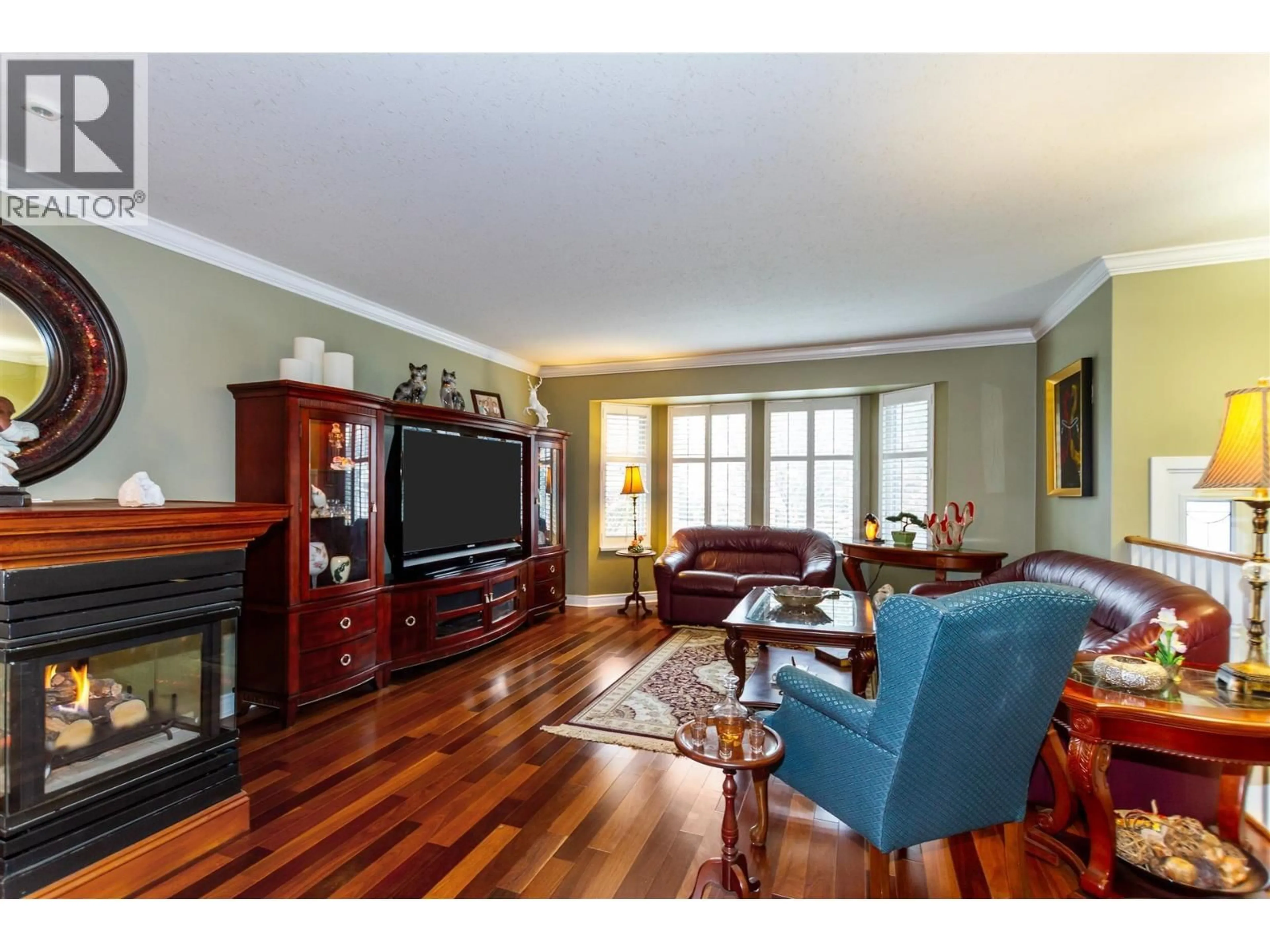 Living room with furniture, wood/laminate floor for 12193 LINDSAY PLACE, Maple Ridge British Columbia V2X9S3