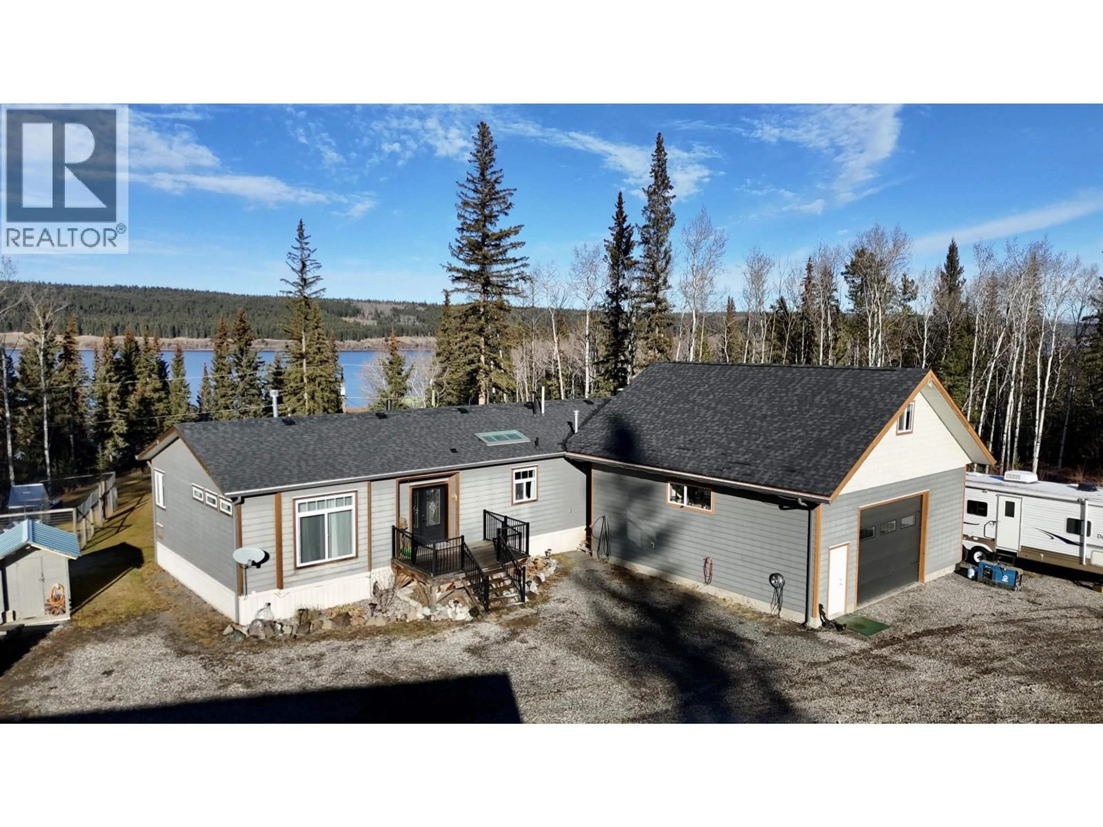 A pic from outside/outdoor area/front of a property/back of a property/a pic from drone, water/lake/river/ocean view for 6482 WATSON ROAD, Horse Lake British Columbia V0K1X3