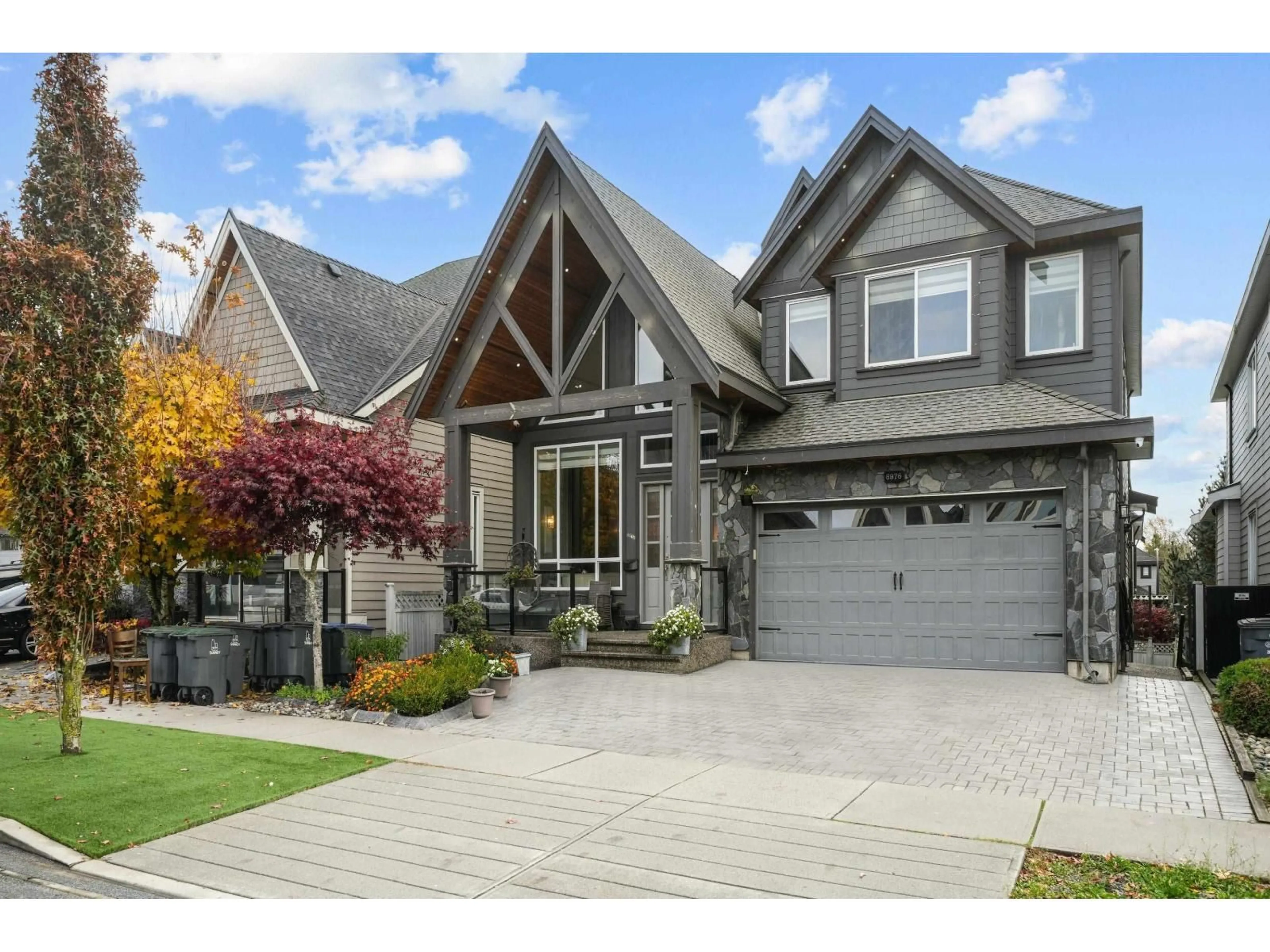 Home with brick exterior material, street for 6976 149 STREET, Surrey British Columbia V3S1K1