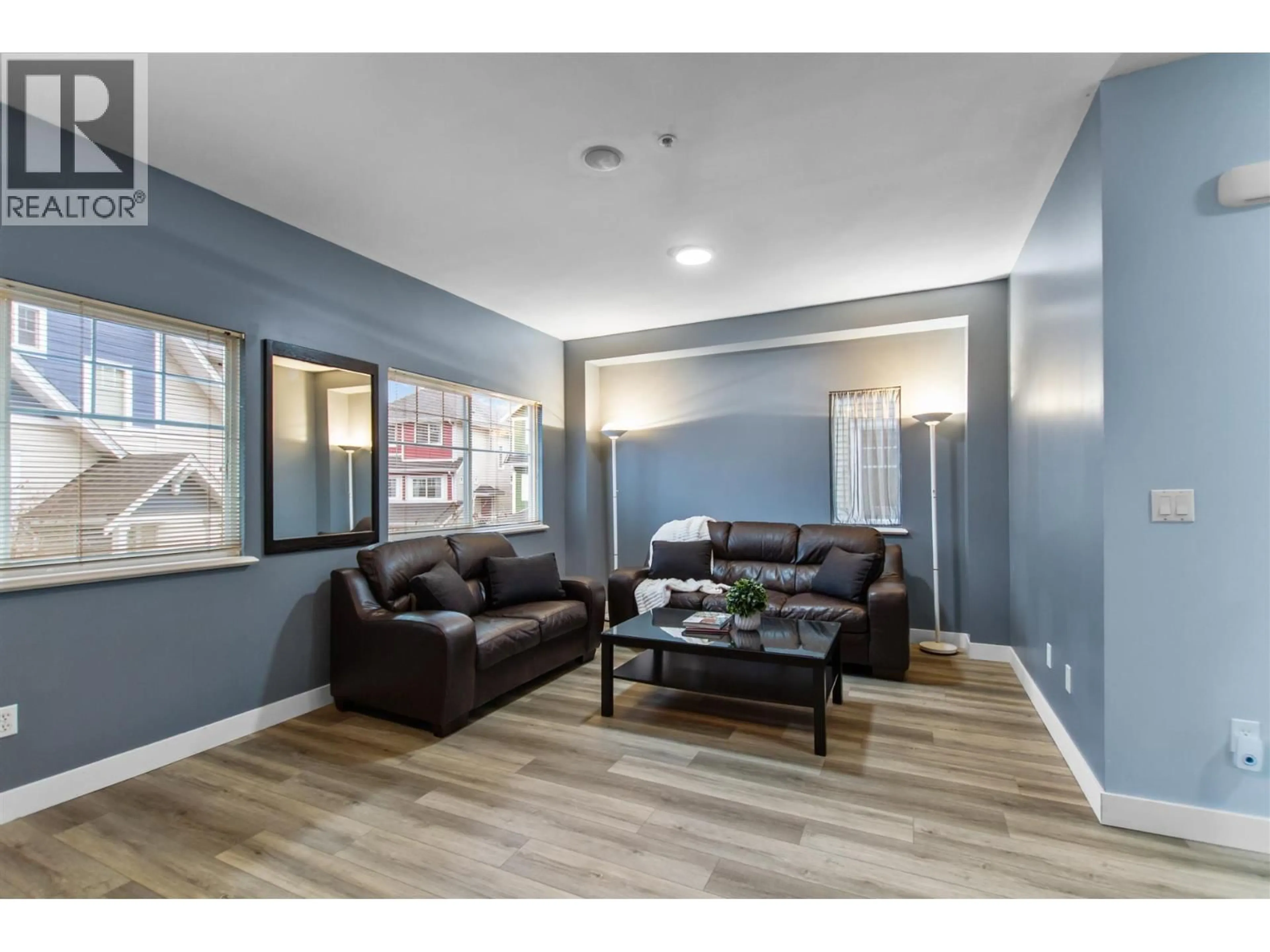 Living room with furniture, wood/laminate floor for 9 - 1108 RIVERSIDE CLOSE, Port Coquitlam British Columbia V3B8C2