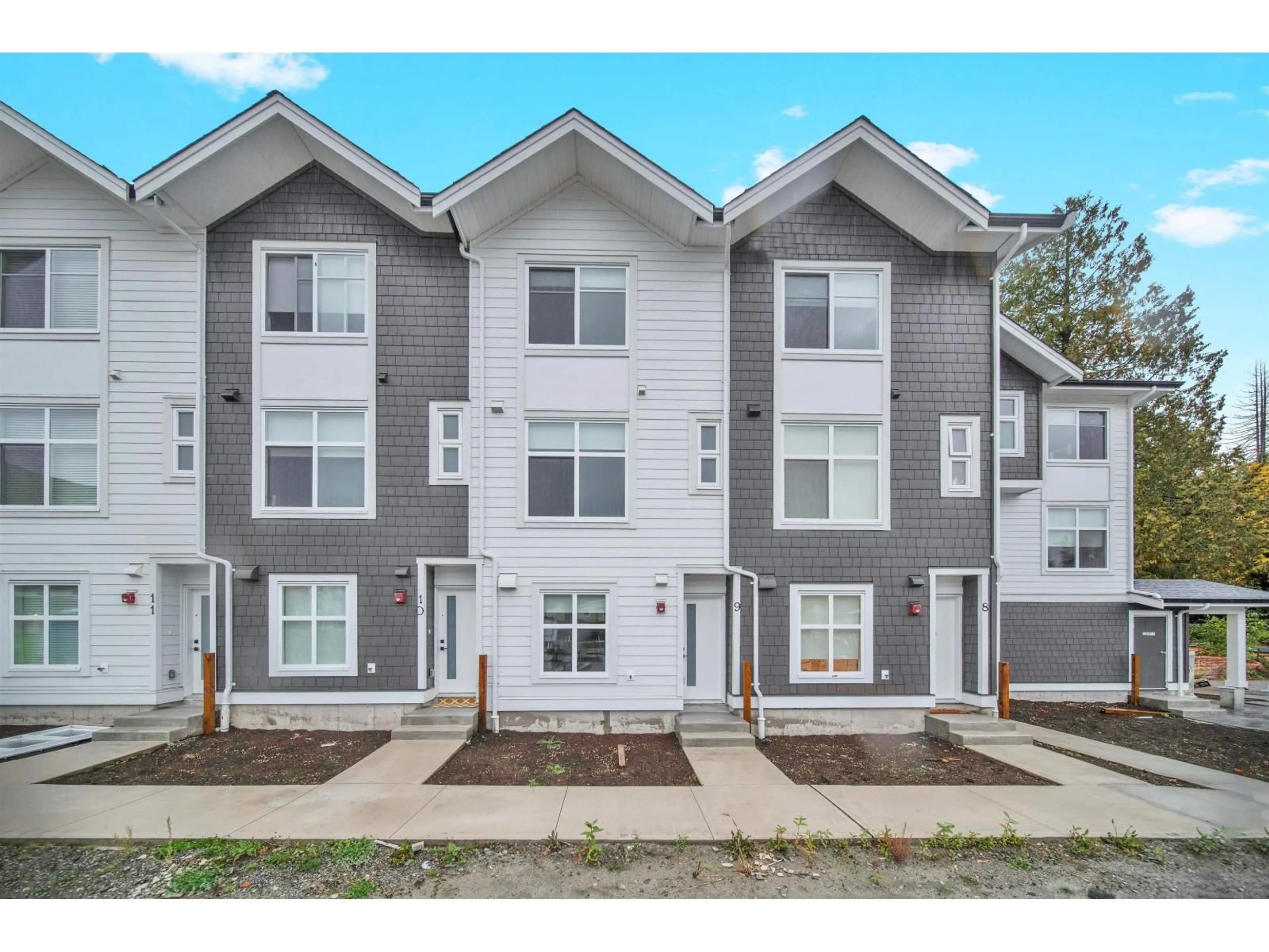 Home with vinyl exterior material, street for 7 - 12770 105, Surrey British Columbia V3V0H2