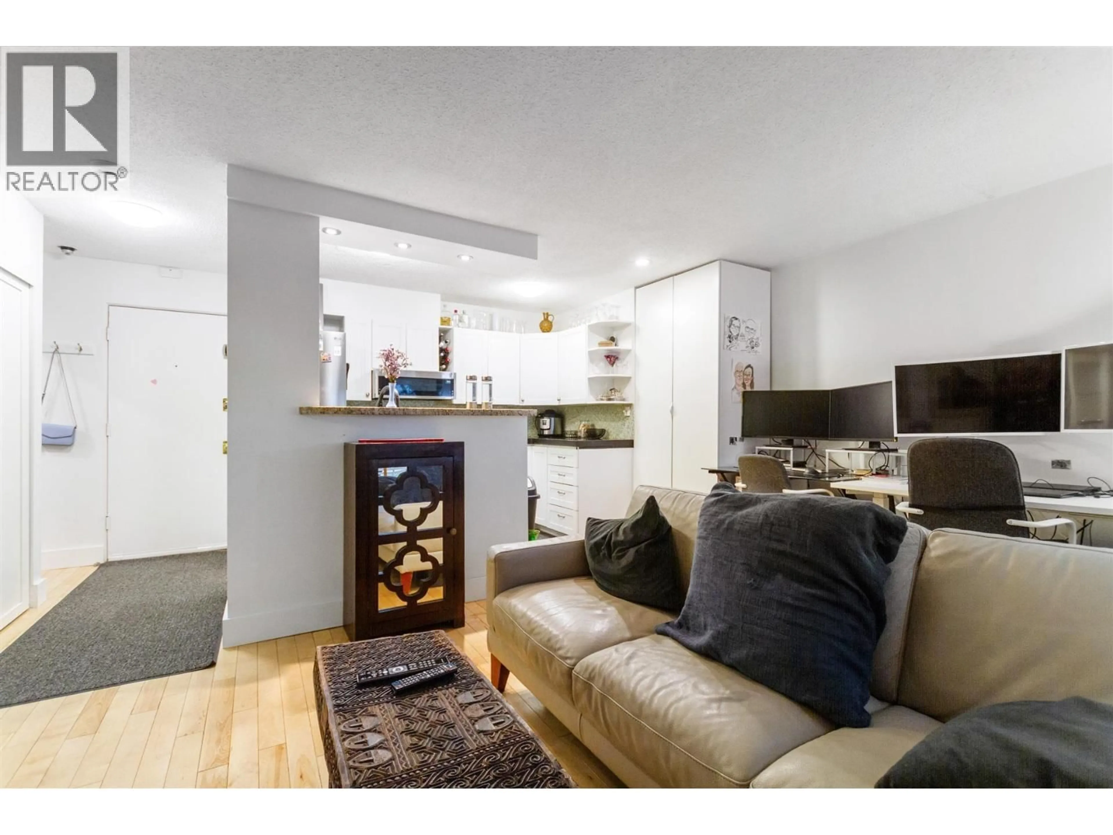 Living room with furniture, wood/laminate floor for 213 - 711 6TH AVENUE, Vancouver British Columbia V5T1L7