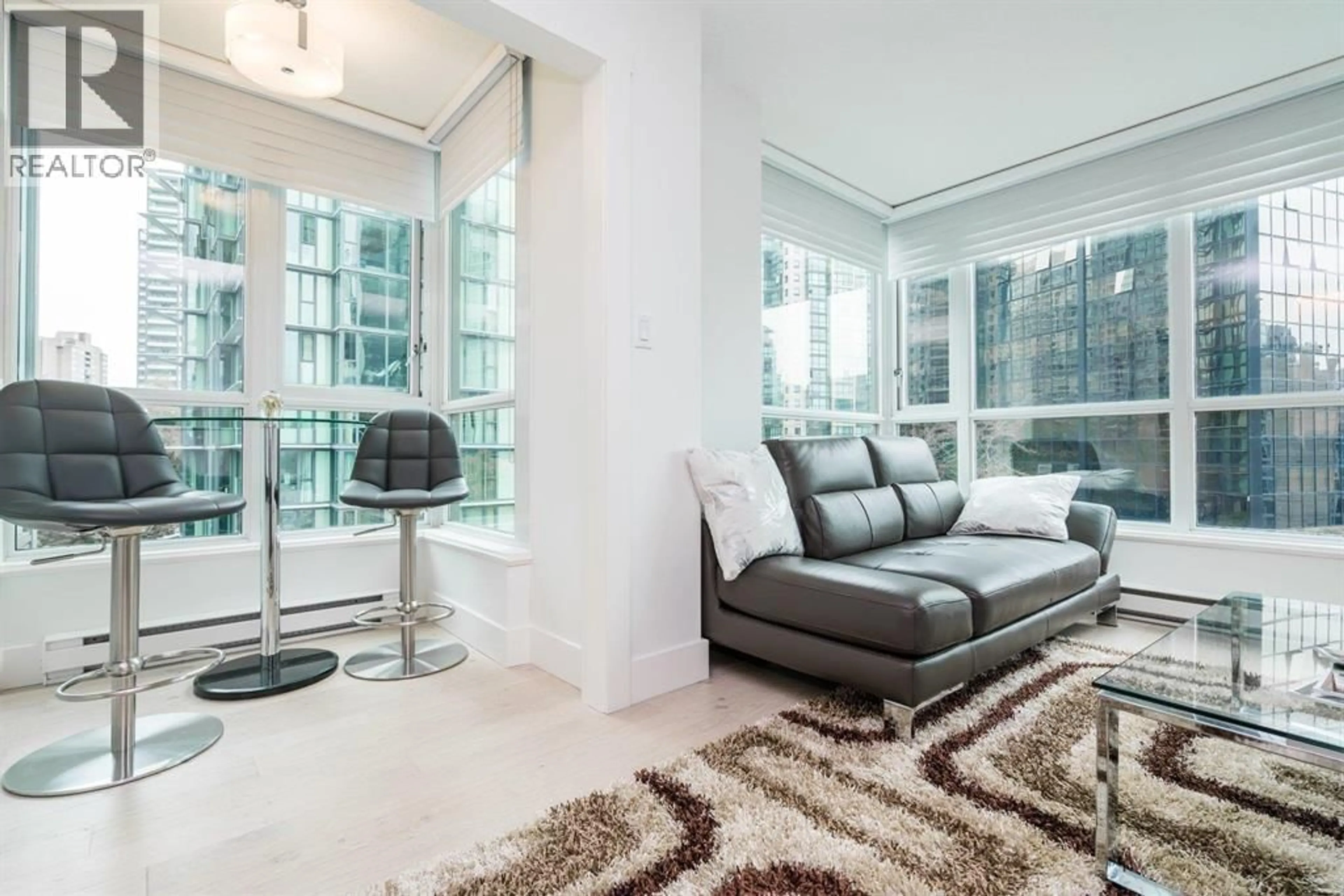 Living room with furniture, unknown for 902 - 1328 PENDER STREET, Vancouver British Columbia V6E4T1