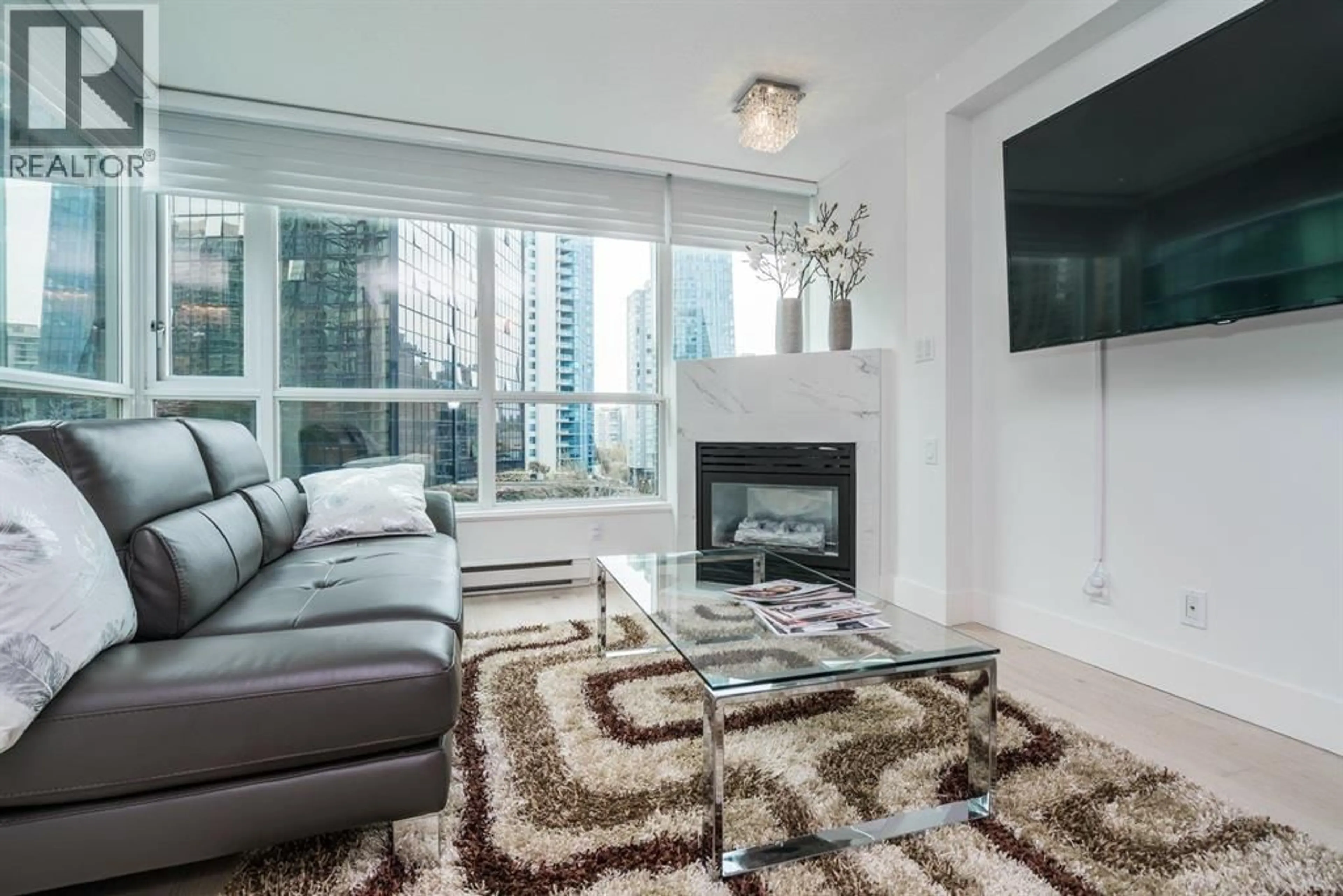 Living room with furniture, carpet floor for 902 - 1328 PENDER STREET, Vancouver British Columbia V6E4T1