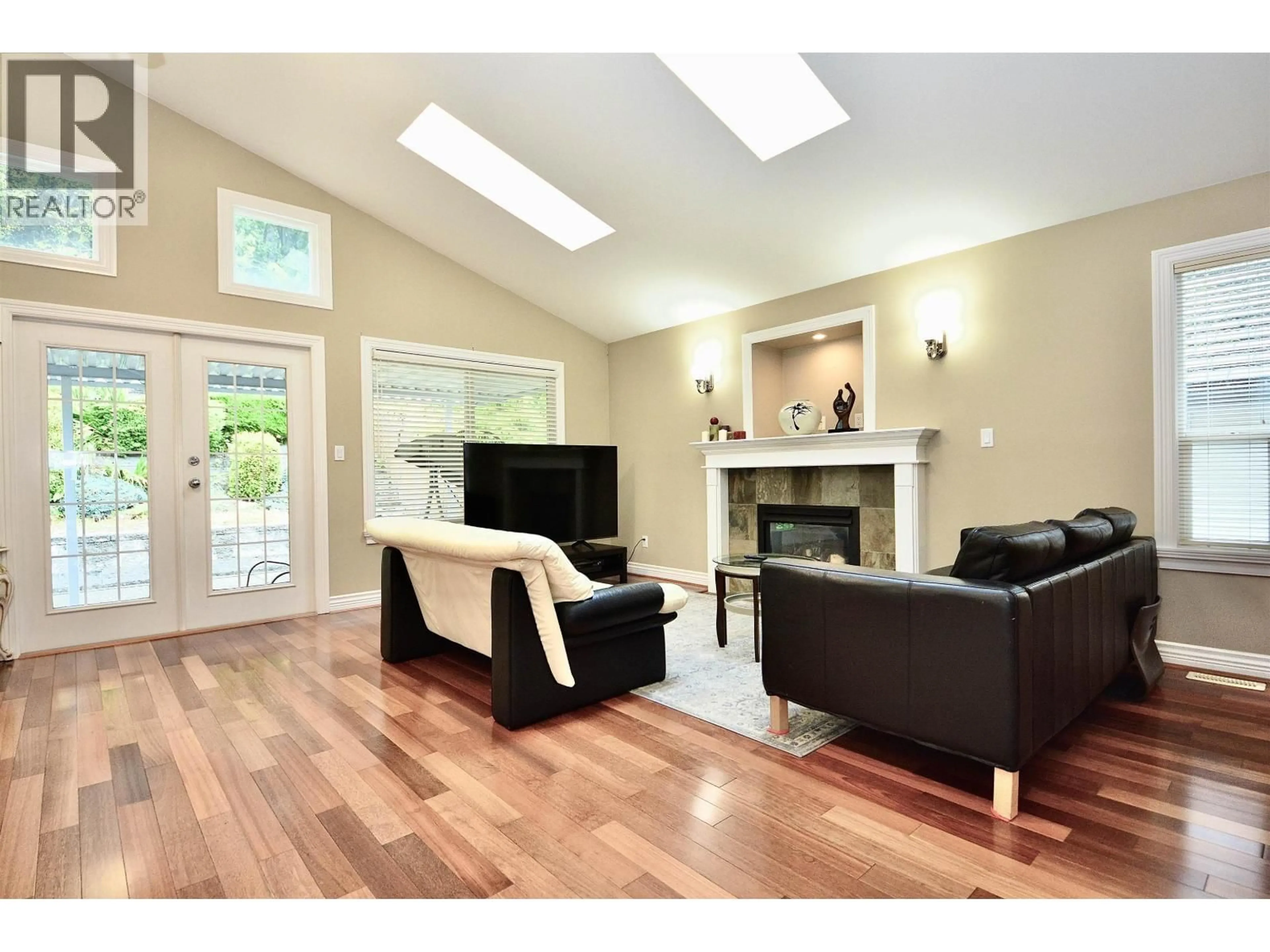 Living room with furniture, wood/laminate floor for 3035 MAPLEWOOD COURT, Coquitlam British Columbia V3E3P3