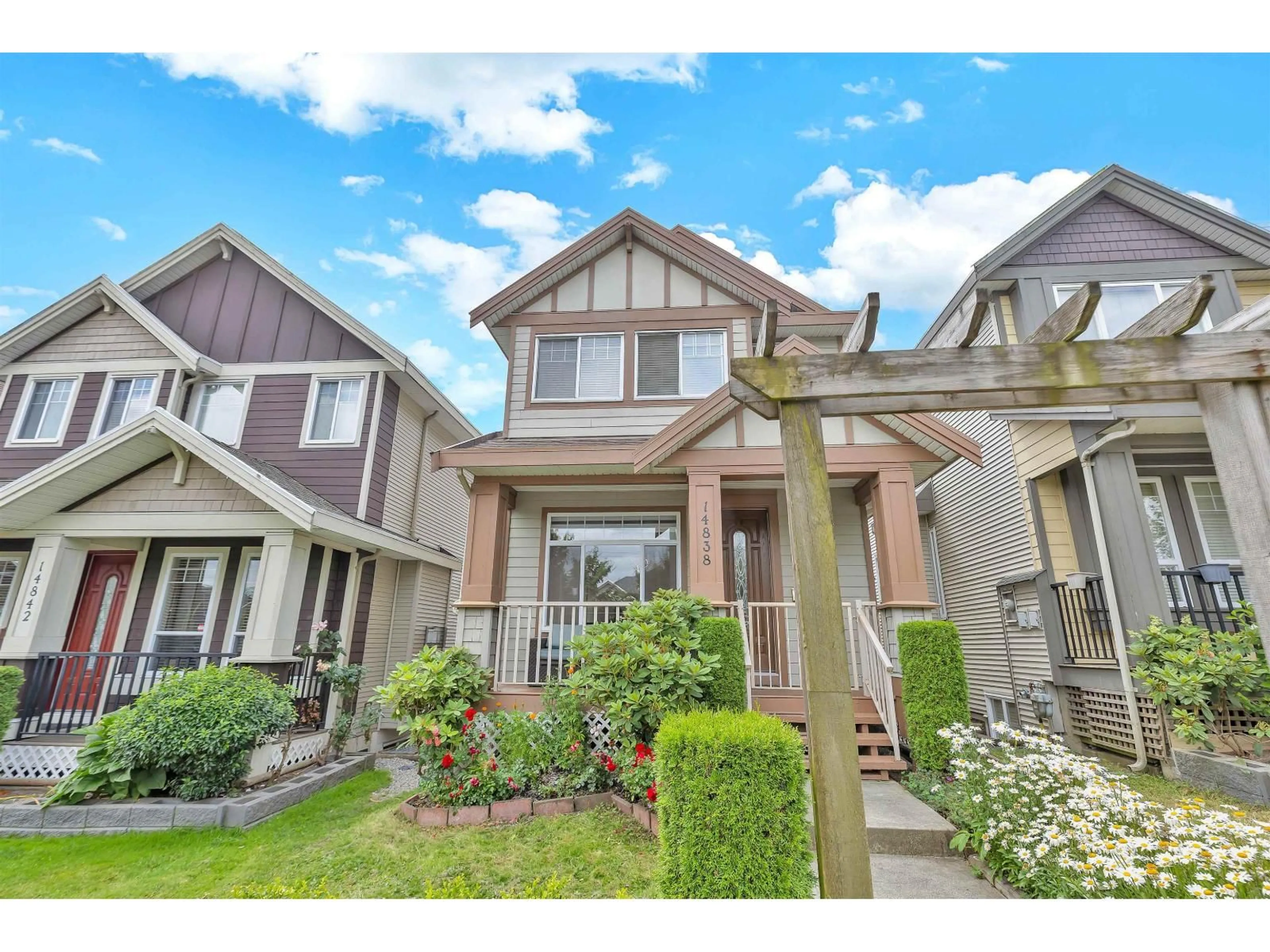 Home with vinyl exterior material, street for 14838 72 AVENUE, Surrey British Columbia V3S2G1