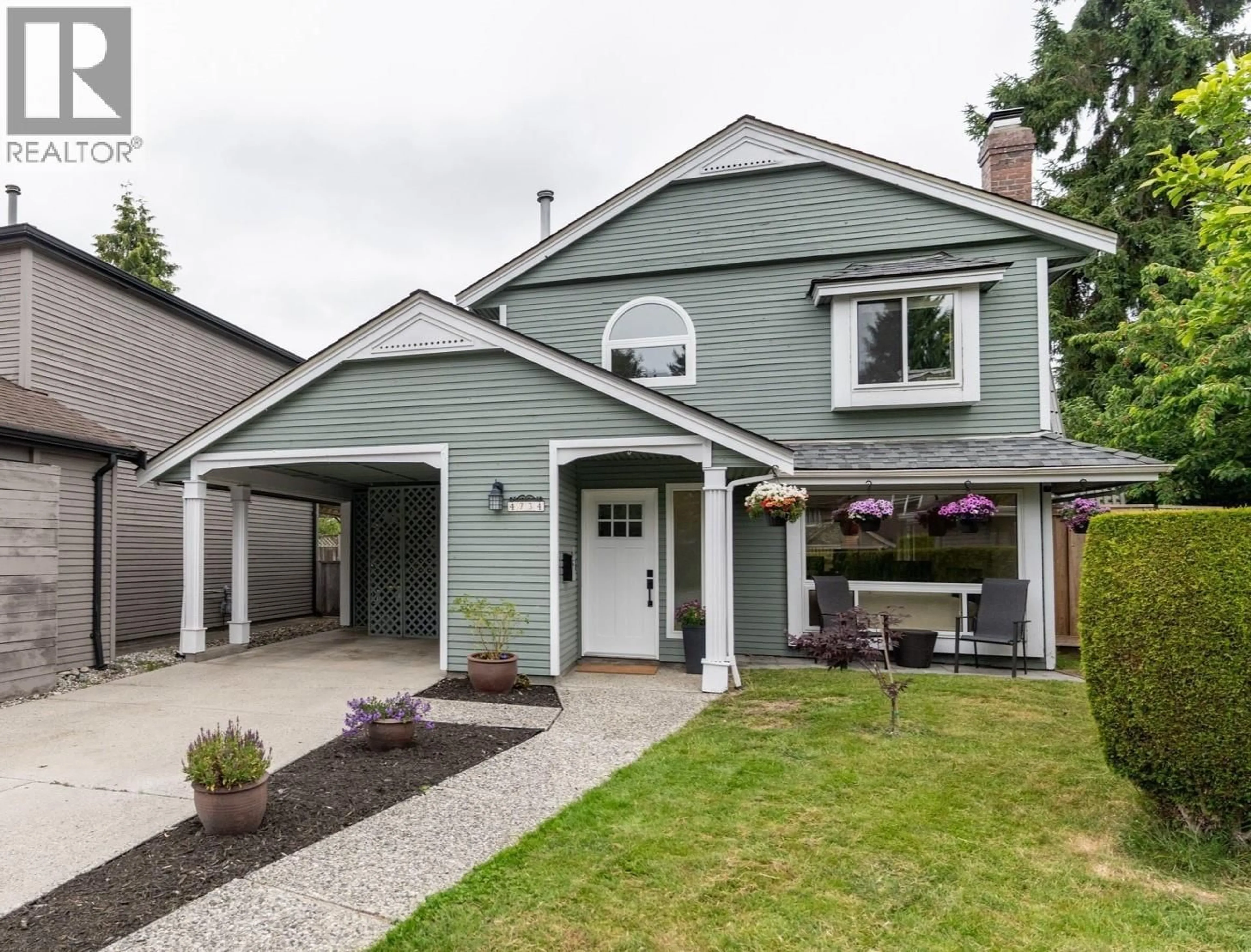 Home with vinyl exterior material, street for 4734 CEDAR TREE LANE, Ladner British Columbia V4K4G6