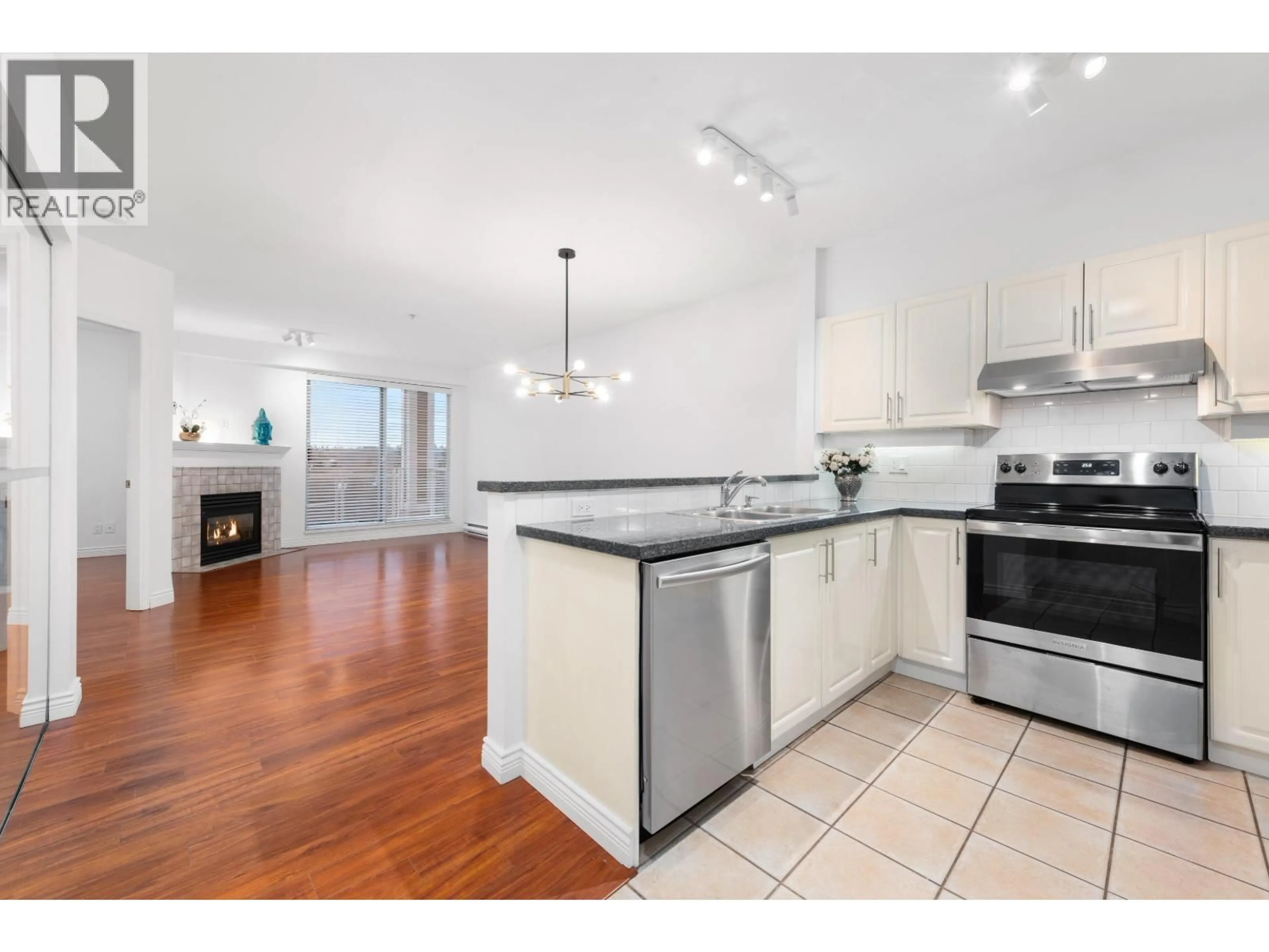 Open concept kitchen, unknown for 217 - 3629 DEERCREST DRIVE, North Vancouver British Columbia V7G2S9